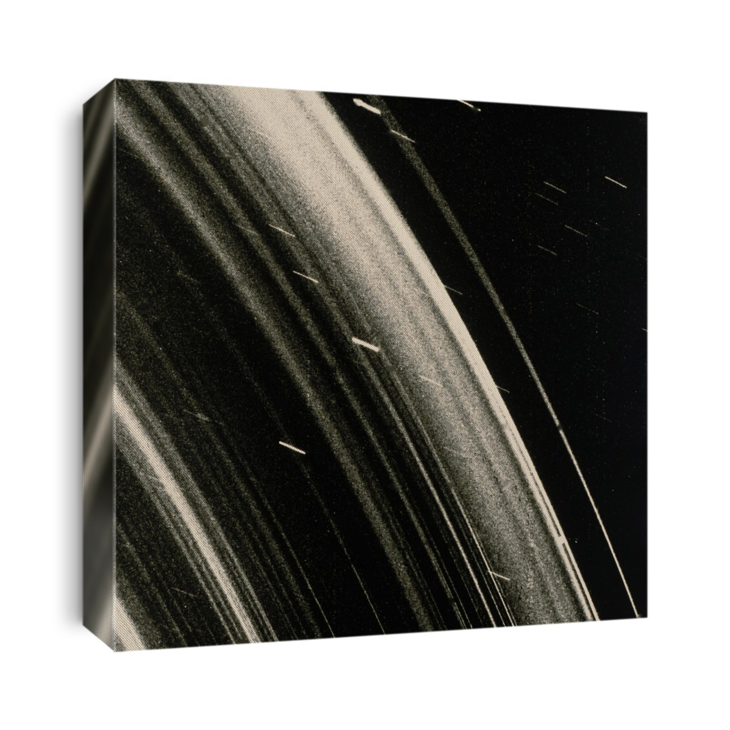 Voyager 2 image of the Uranian ring system, taken on January 24, 1986. The picture reveals a continuous distribution of small particles throughout the ring system. It also shows all the previously known rings, though some of the brightest features in the picture are bright dust lanes which have not been detected before. The long exposure time has resulted in streaks in the photo of trailed stars.