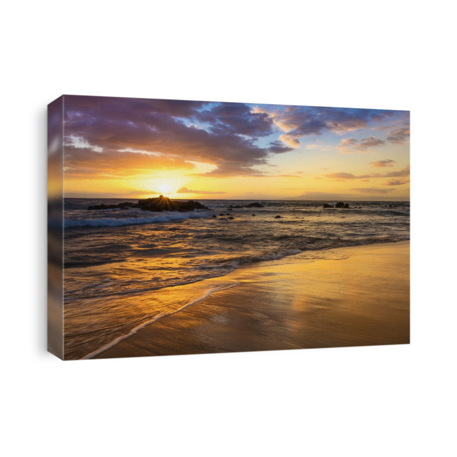 A golden sunset with reflection on sand at Ulua Beach; Wailea, Maui, Hawaii, United States of America