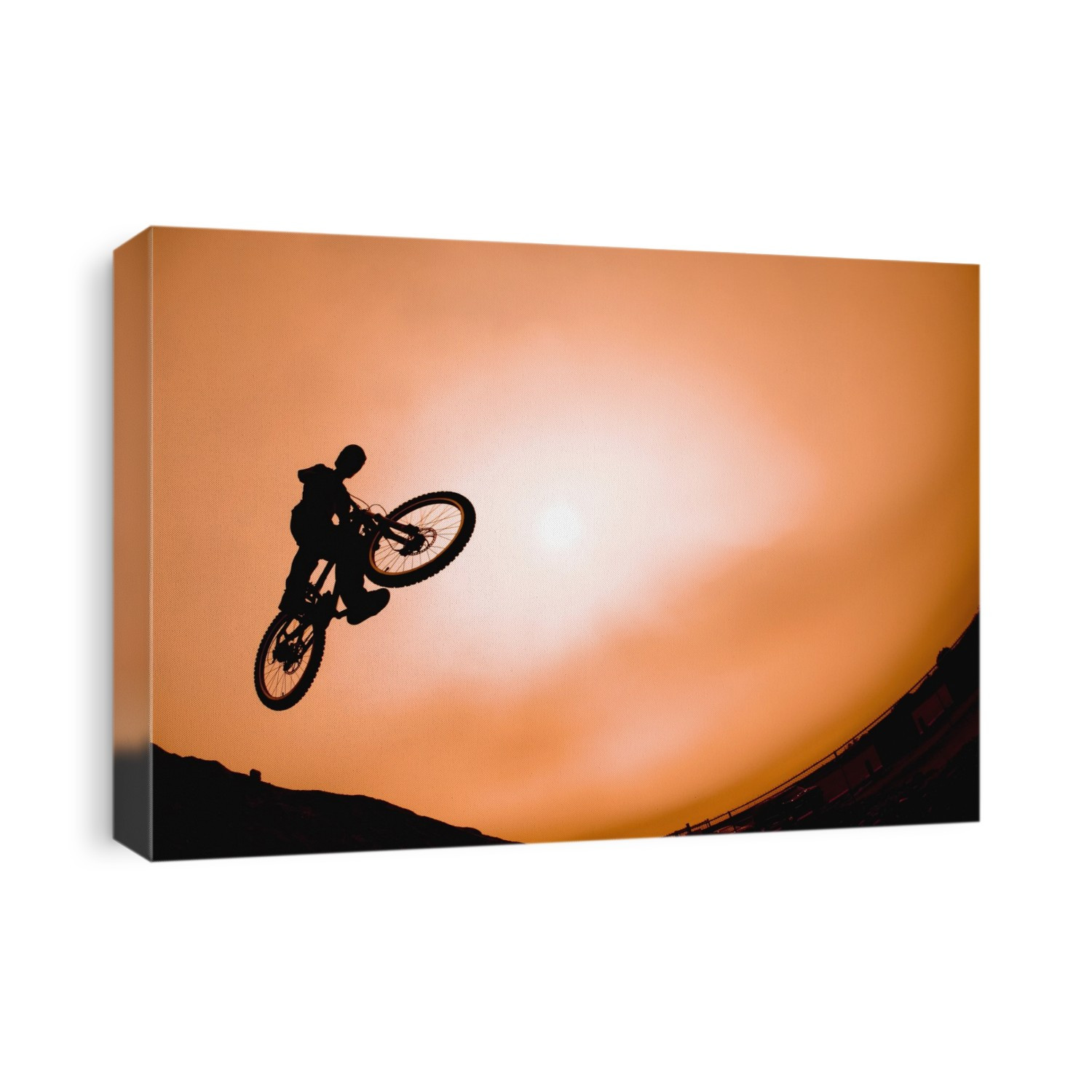 Silhouette Of Stunt Cyclist