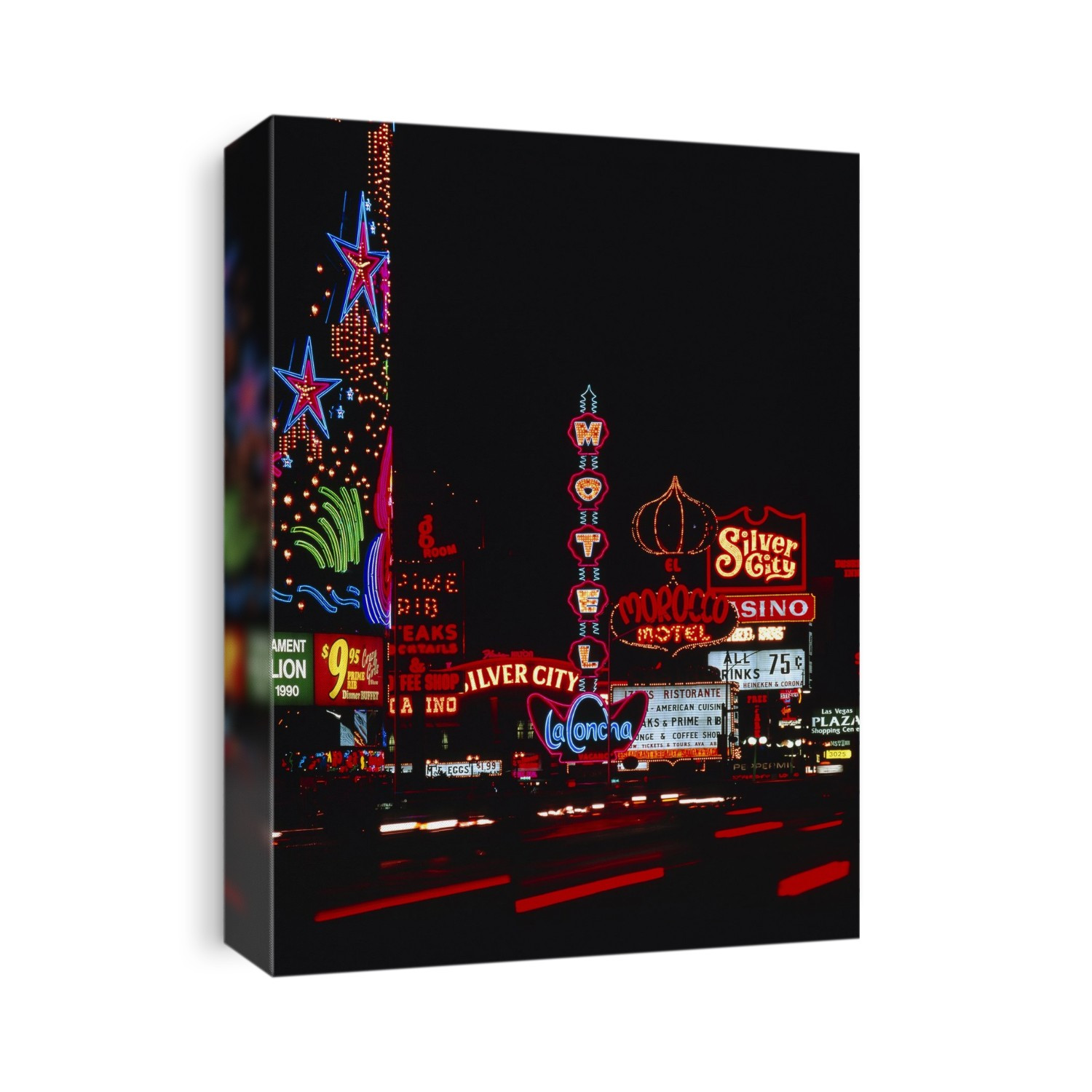 Las Vegas at night. Photograph showing some of the millions of coloured light bulbs which adorn the streets of Las Vegas, USA. The famous illuminated advertising signs of the hotels and casinos of Las Vegas use enough electricity to occupy the output of a whole power station.
