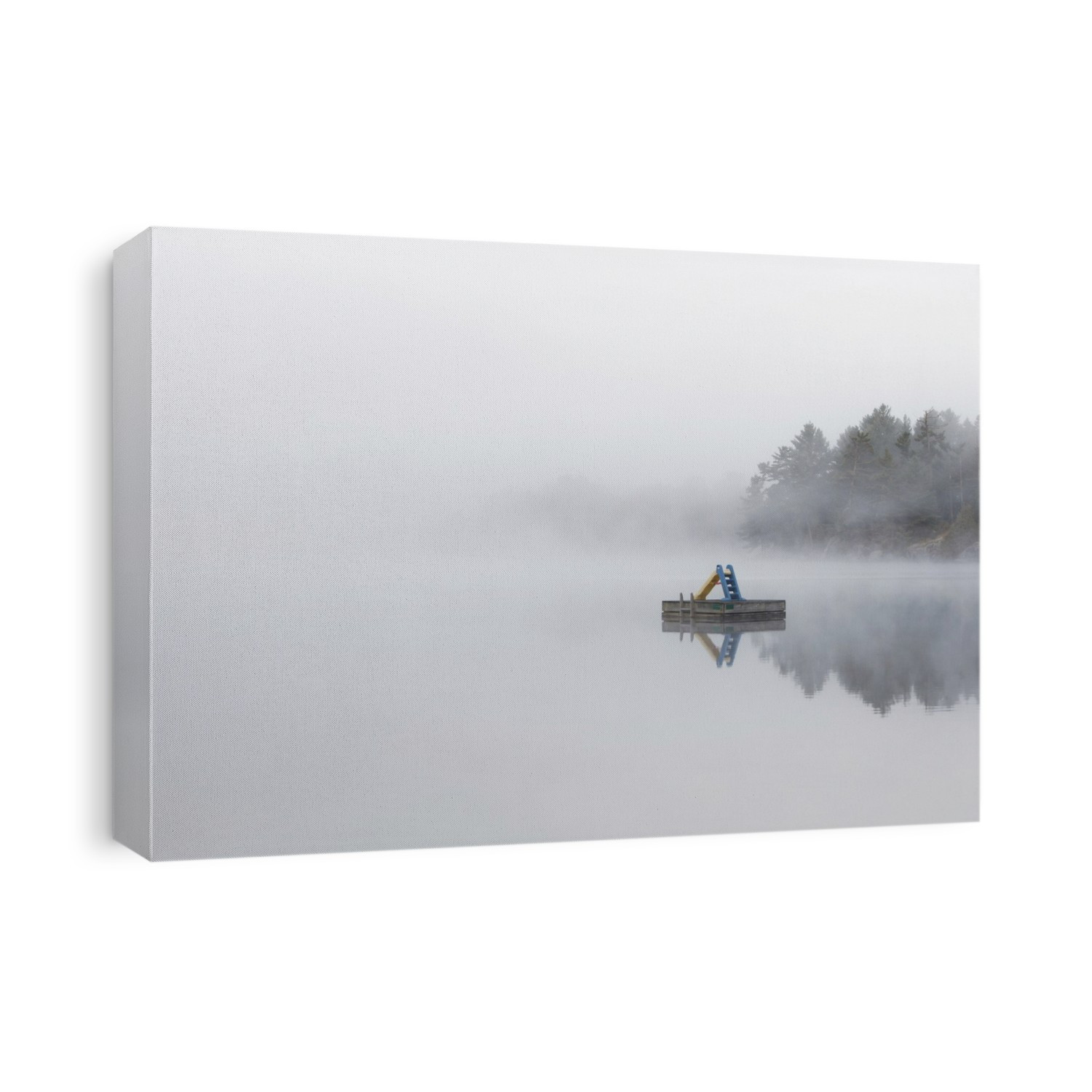 Fog shrouds a small island on Turtle Lake in Ontario's Muskoka Region, near Rosseau; Ontario, Canada