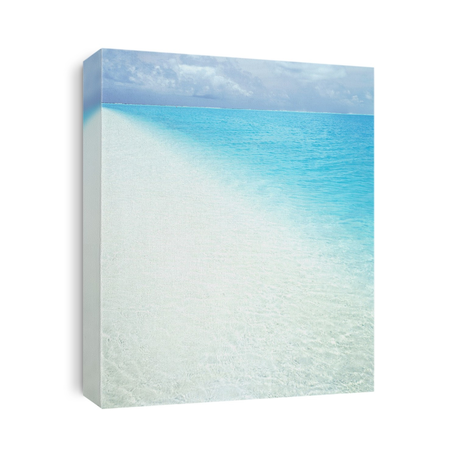 Turquoise ocean water stretching to the horizon and white sand along a tropical island; Cook Islands