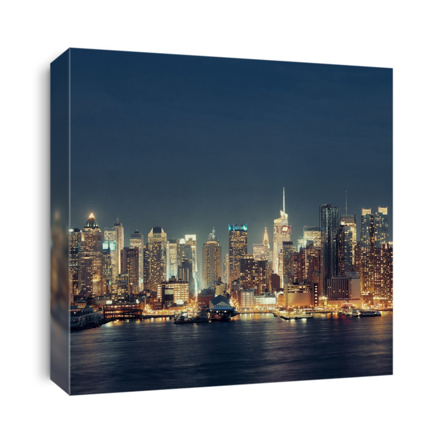 Midtown skyline over Hudson River in New York City with skyscrapers at night