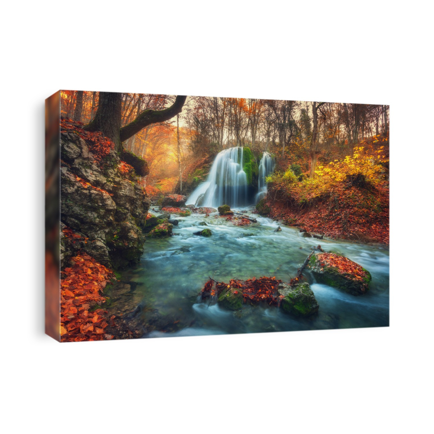 Autumn forest with waterfall at mountain river at sunset. Colorful landscape with trees, stones, waterfall and vibrant red and orange foliage. Nature background. Fall woods. Beautiful blurred water