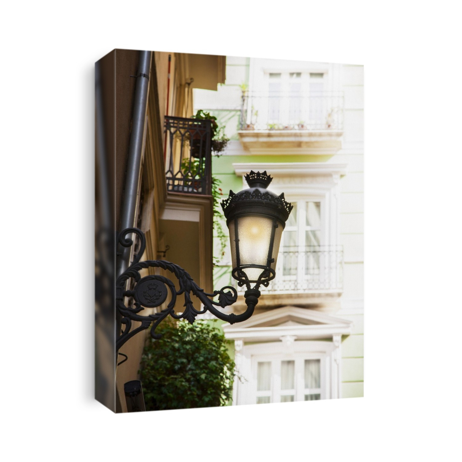 Lantern on building, Valencia, Spain.