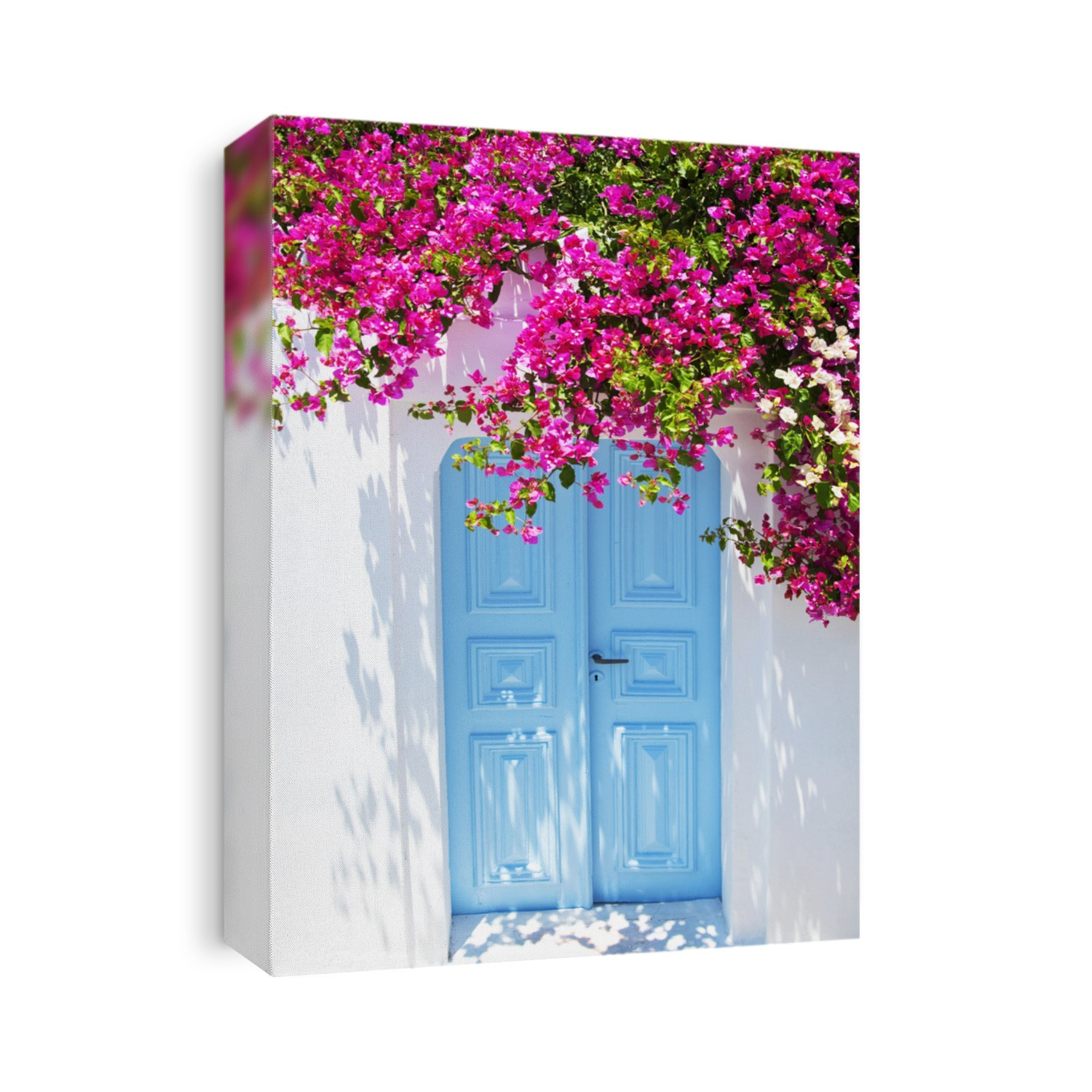 Old blue door and pink flowers, traditional Greek architecture, Santorini island, Greece. Beautiful details of the island of Santorini, white houses, blue doors and shutters, the Aegean Sea.