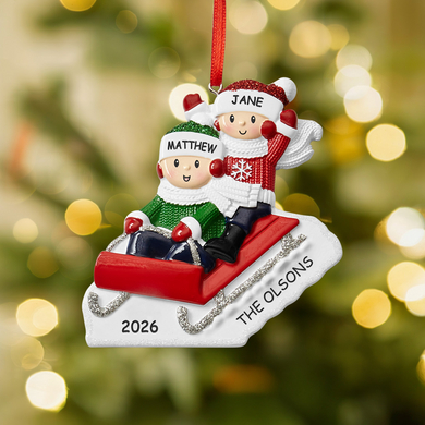 Fun Family Sledding Couple Ornament