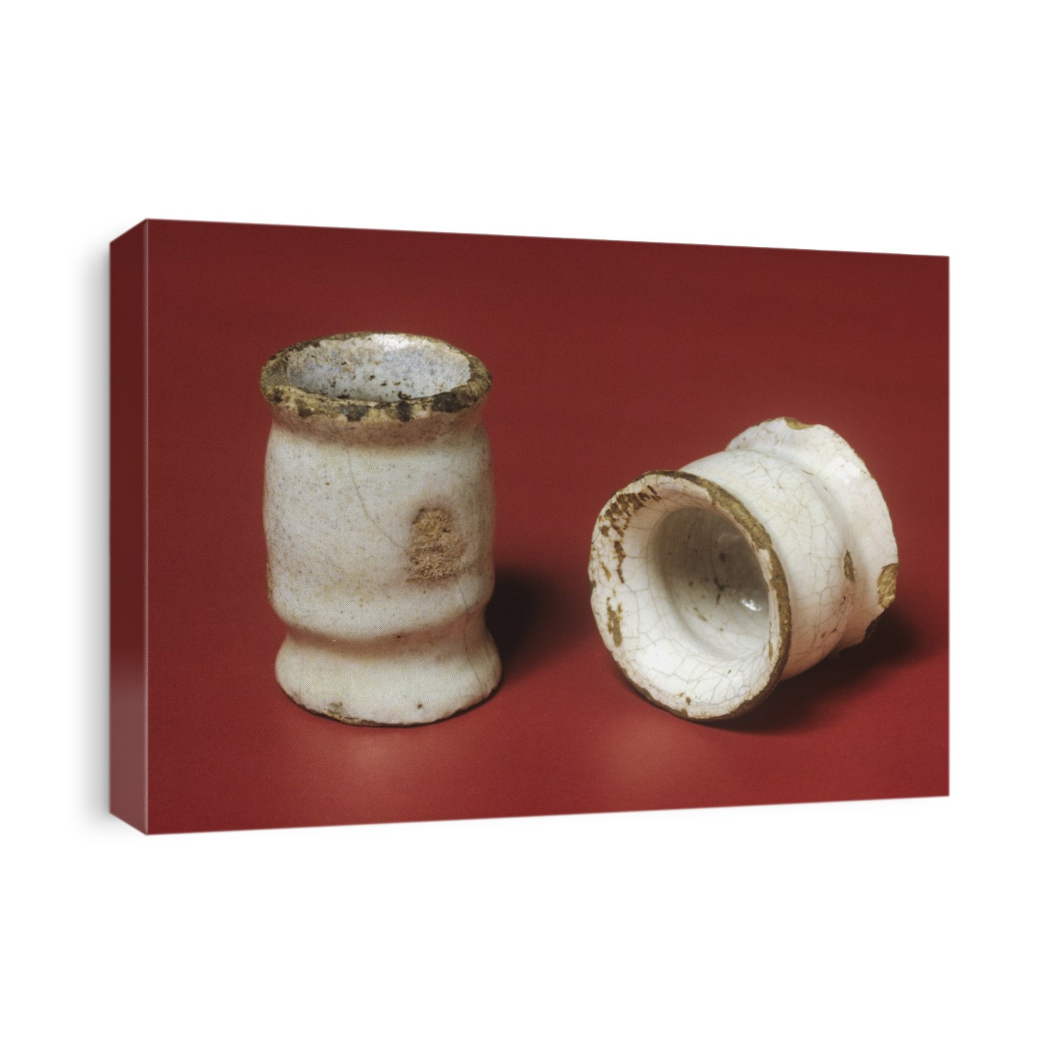 Two tin glaze ointments pots, dating from 1700, England. These would have originally contained pharmaceutical preparations for application to the skin.