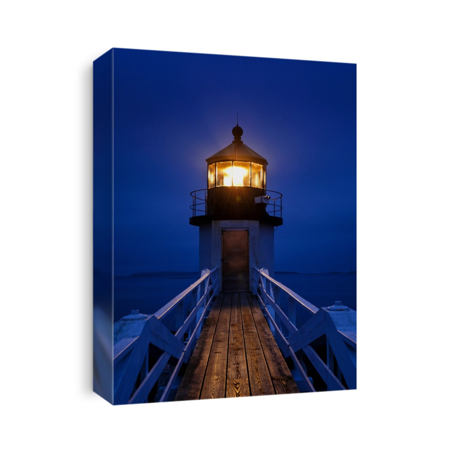 Marshall Point Light Station glowing at night in Port Clyde.