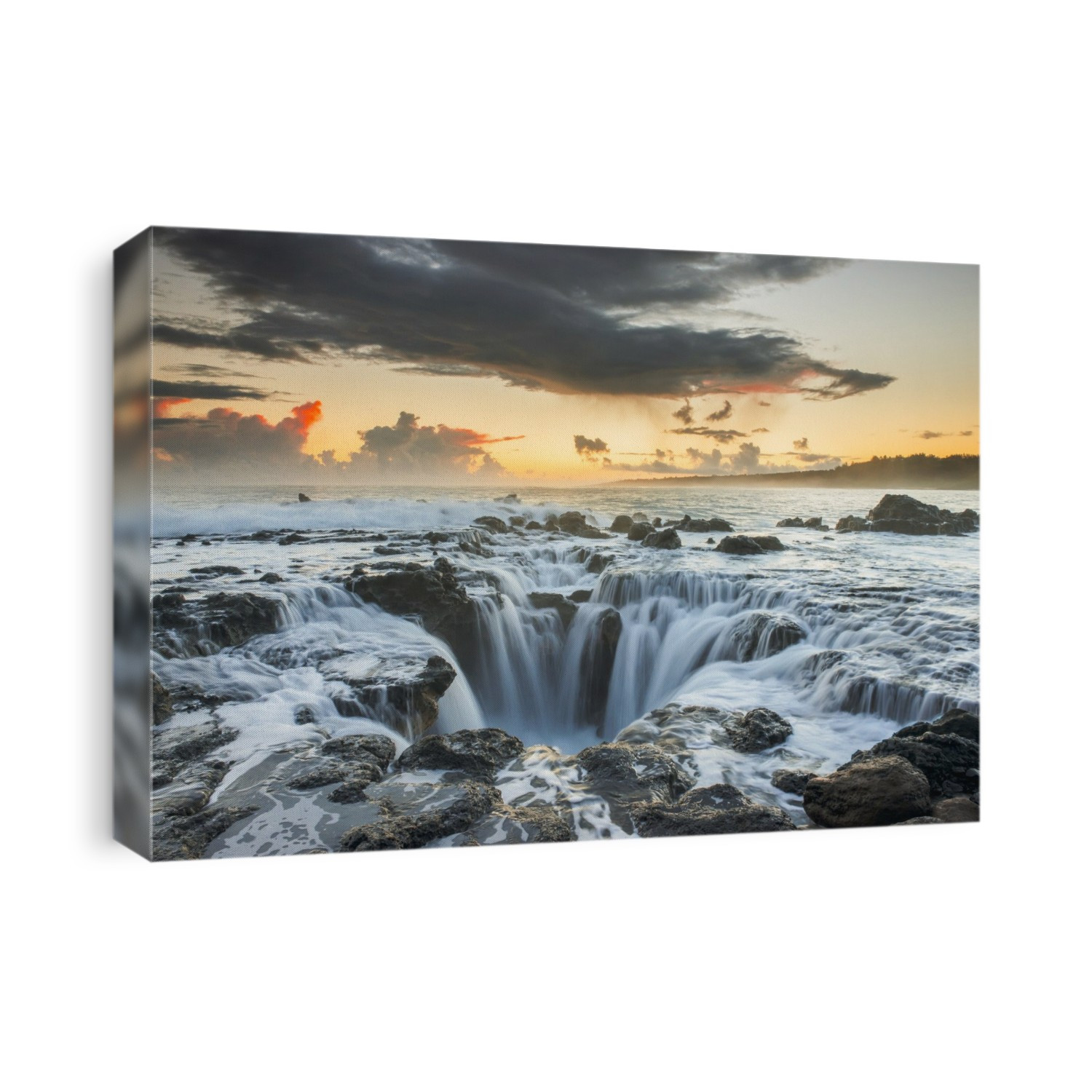 Surf Spills Into A Hole In A Rock Outcrop On The East Side Of Kauai; Kauai, Hawaii, United States Of America