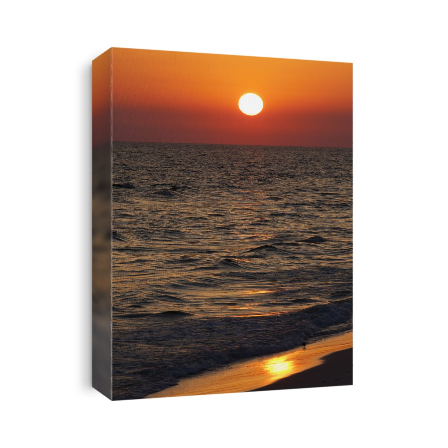 Sunset over the ocean and a beach. Photographed from Panama City Beach, Florida, USA.
