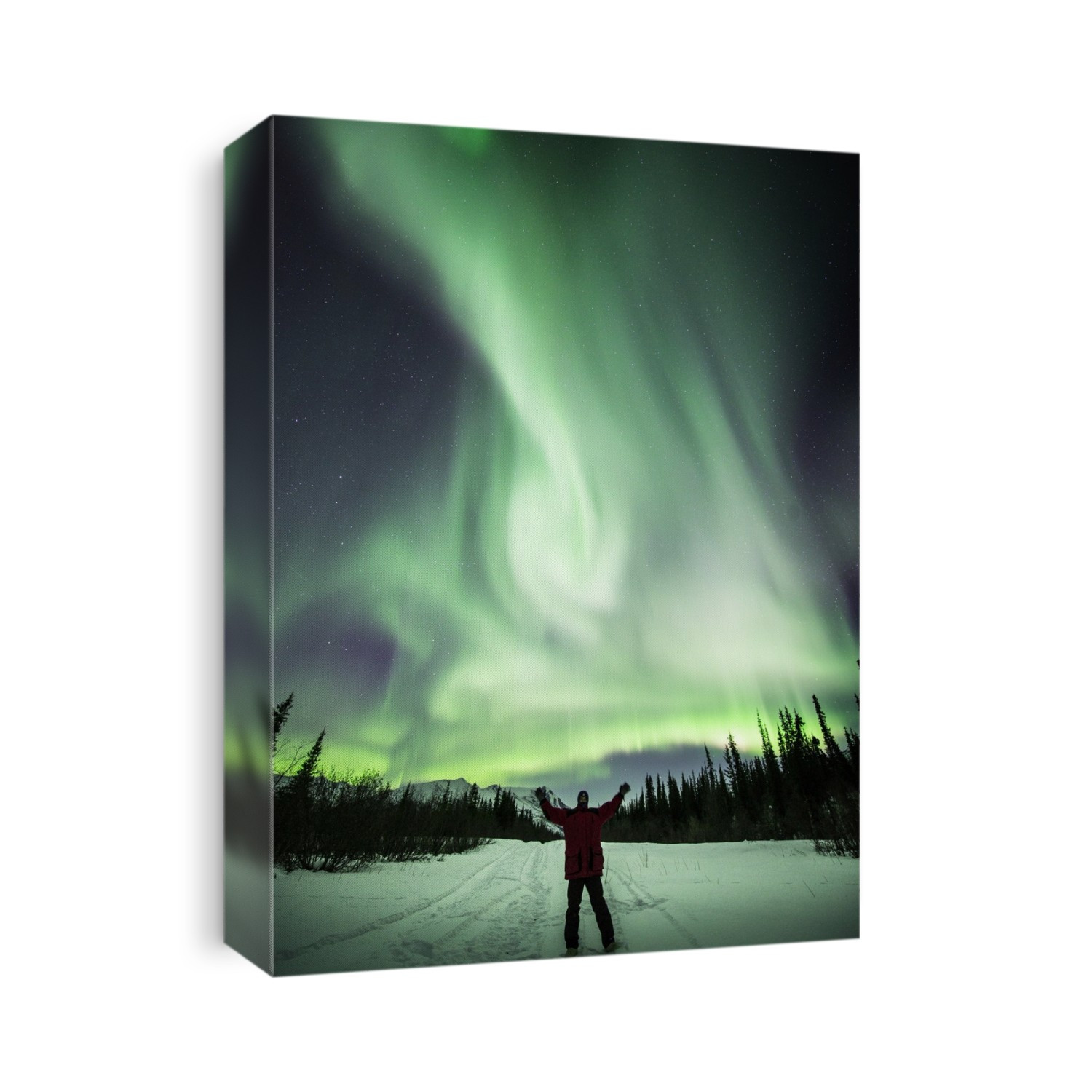 Aurora borealis over a person in the Brooks Range Alaska. This coloured light display (the northern lights) is visible in the night sky at high latitudes. It occurs when charged and energetic particles from the Sun (the solar wind) are drawn by Earth's magnetic field to the polar regions. Hundreds of kilometres up, they collide with gas molecules and atoms, causing them to emit light. Photographed in Wiseman, Alaska, USA.