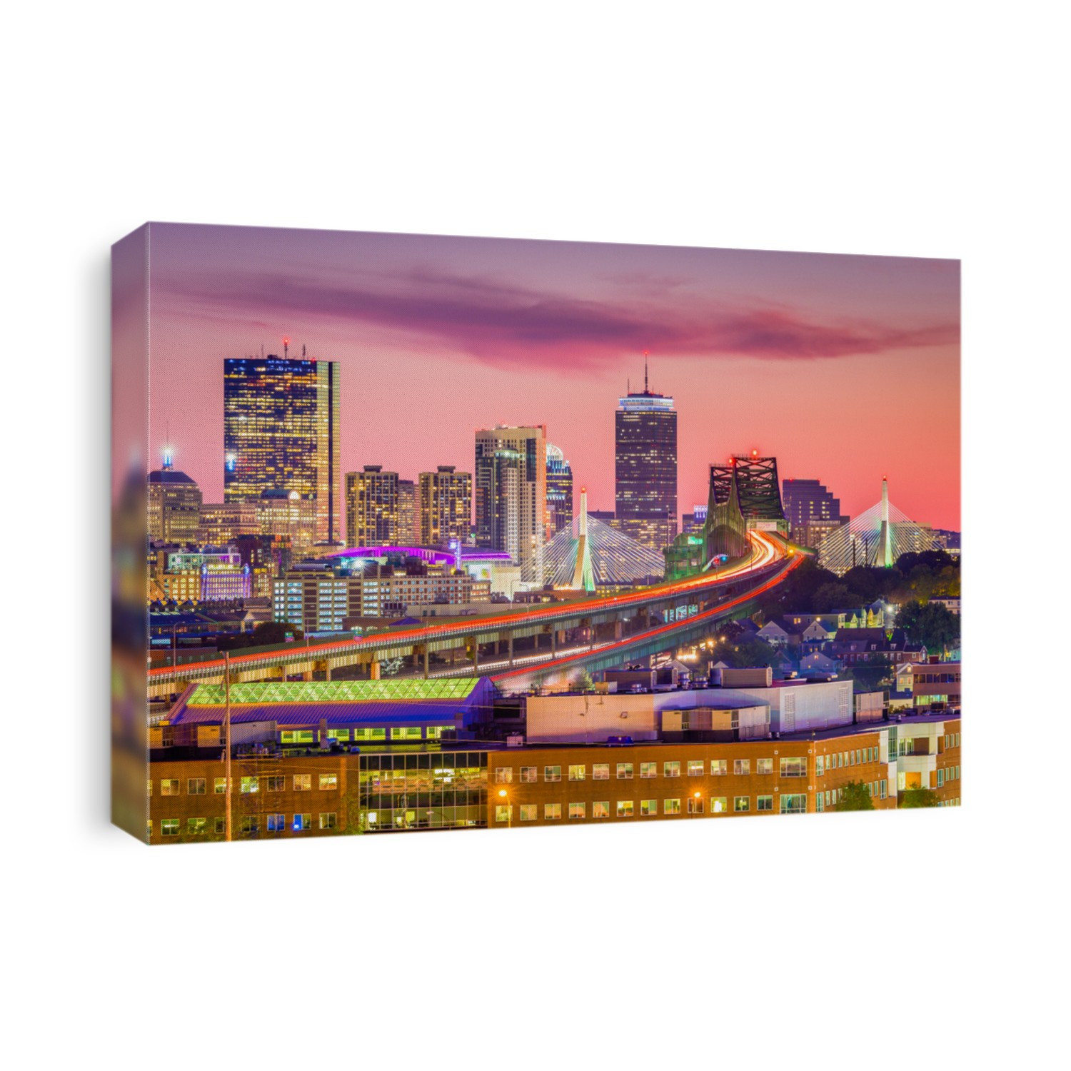Boston, Massachusetts, USA skyline with bridges and highways at dusk.