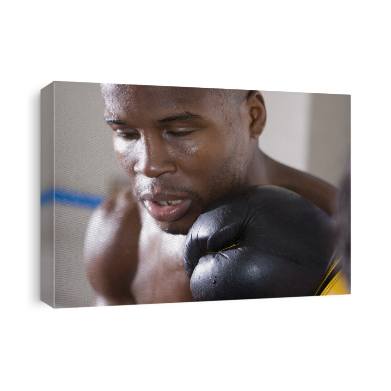 MODEL RELEASED. Boxer taking a punch on the chin.