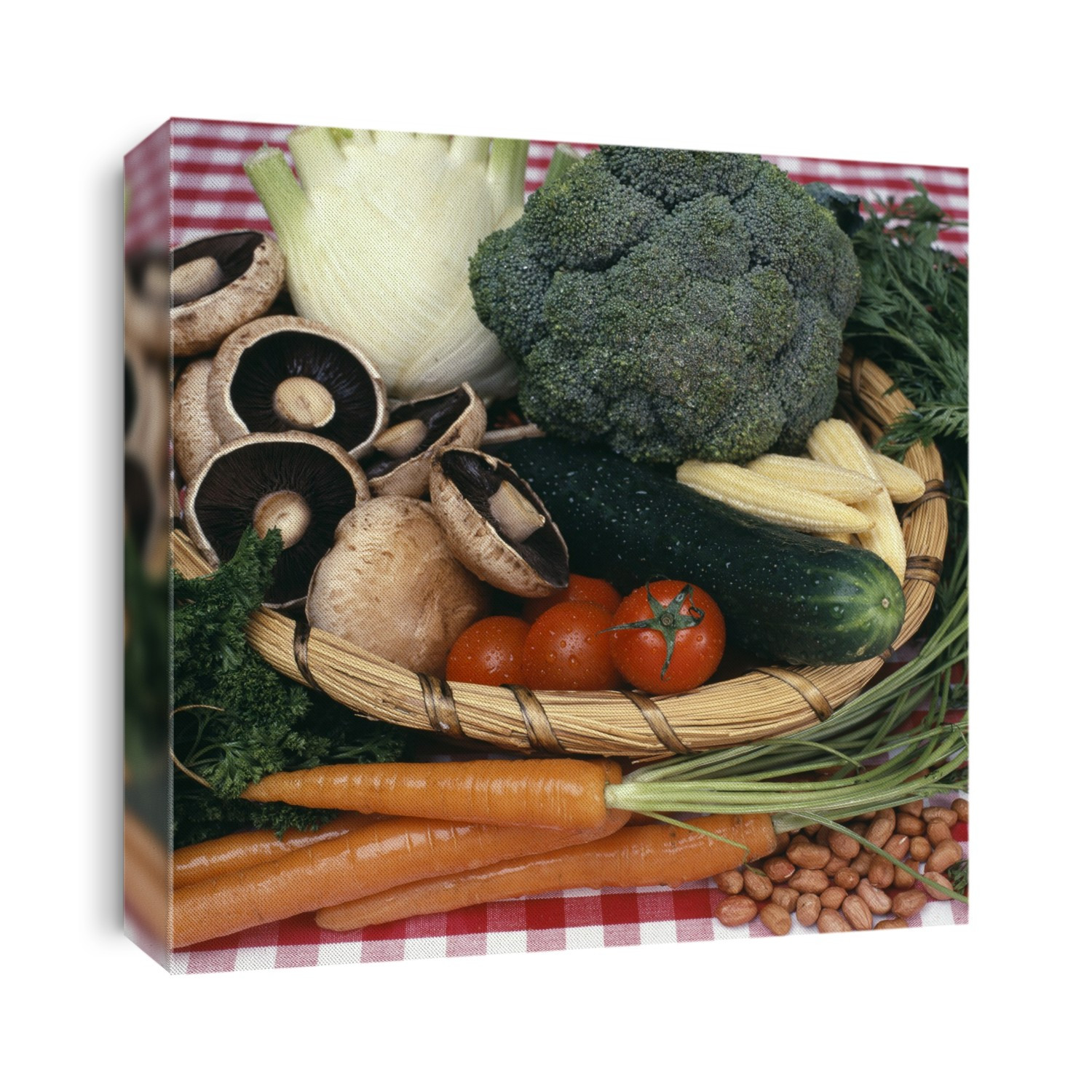 Organic vegetables. In the basket are fennel (upper left), broccoli (upper right), baby sweetcorn, cucumber, tomatoes and mushrooms. In front of the basket are parsley, carrots and peanuts. Organic vegetables are produced without the use of synthetic materials, such as chemical fertilizers. Organic farmers also do not allow genetically-modified plants and animals in the production of food.