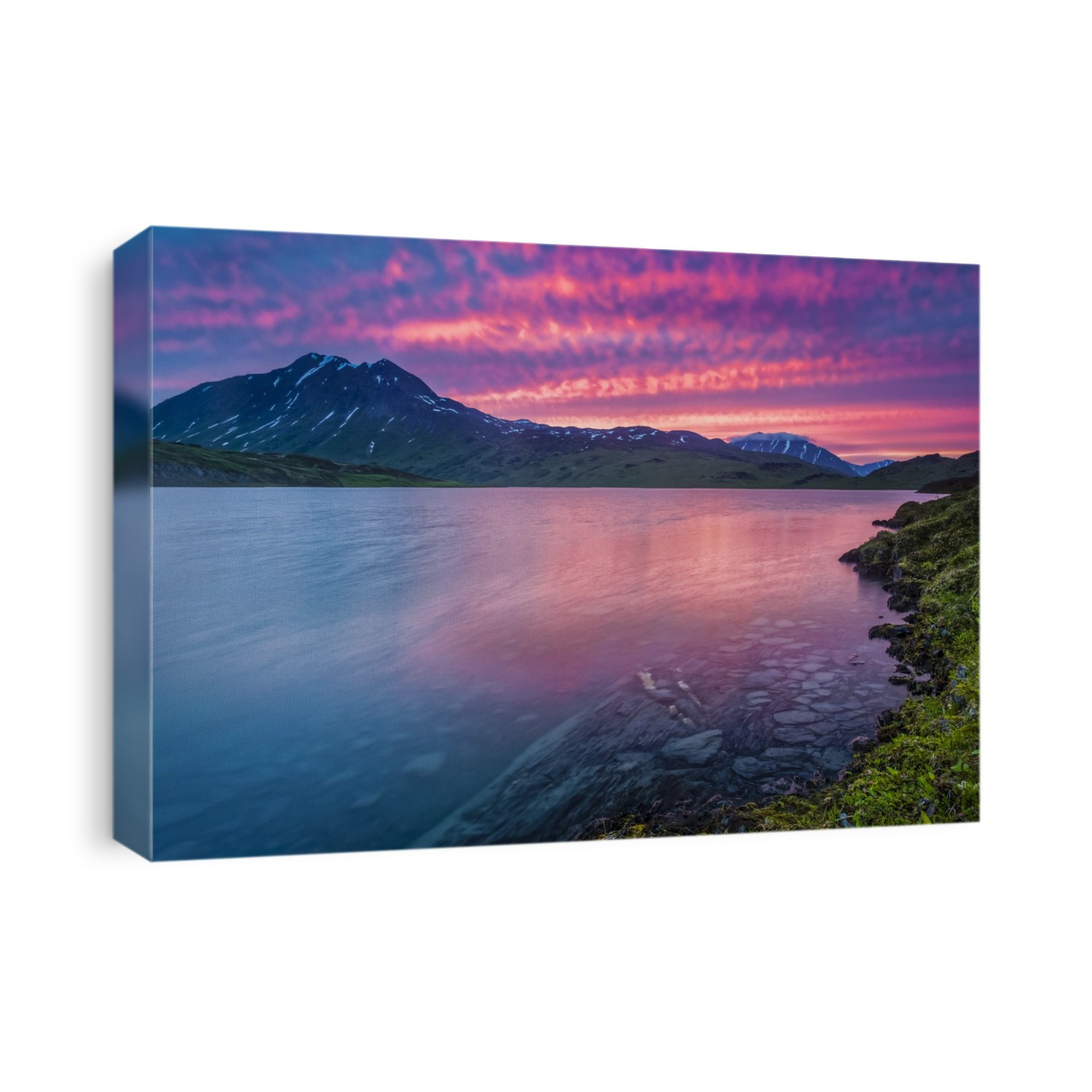 Magenta sky reflects on Lost Lake at dusk, Chugach National Forest, Kenai Peninsula, South-central Alaska in summertime; Seward, Alaska, United States of America