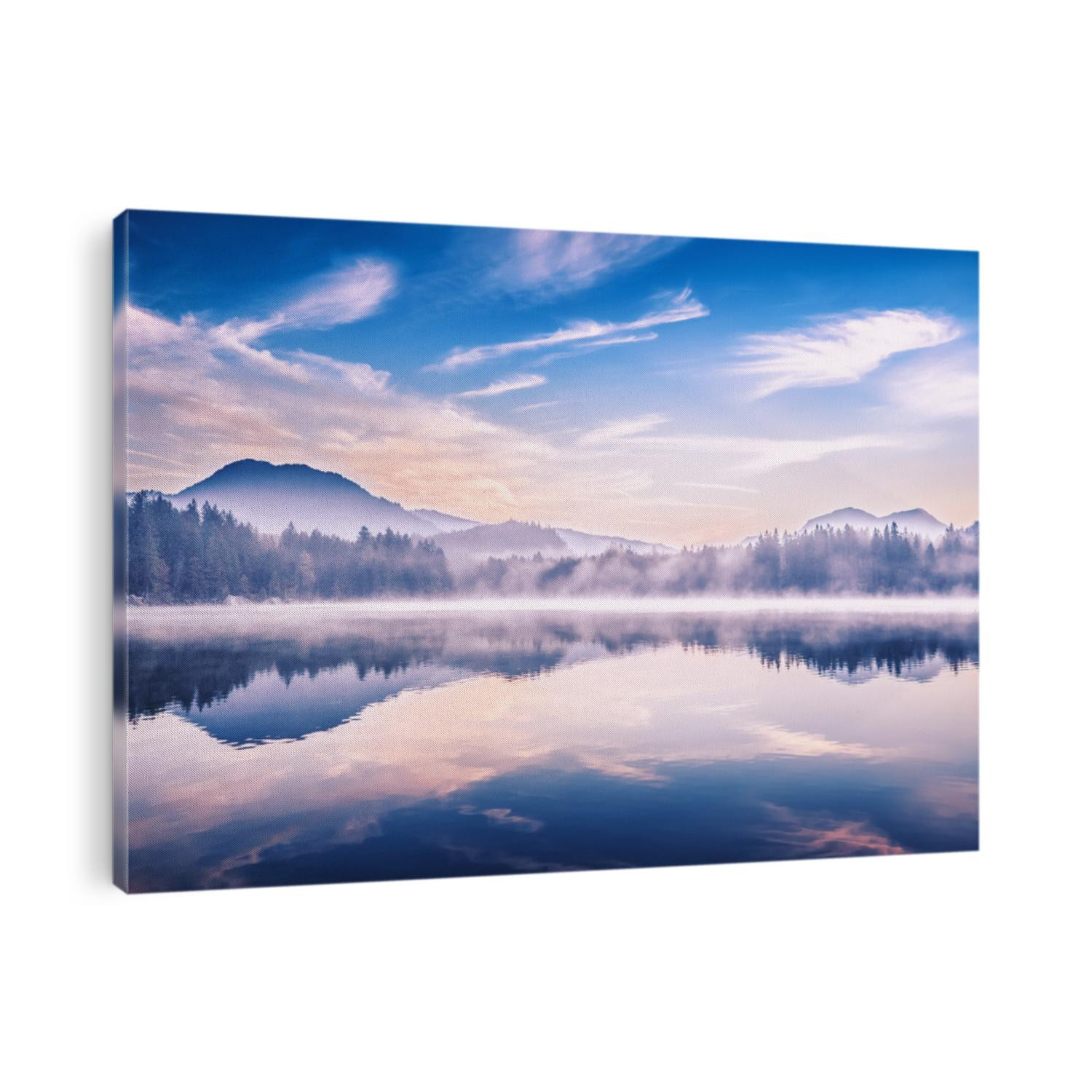 Hintersee lake in Germany, located in Ramsau parkland. Beautiful morning scenery of Alpine lake, misty picturesque landscape. Charming Alps in Background. European popular recreation site.