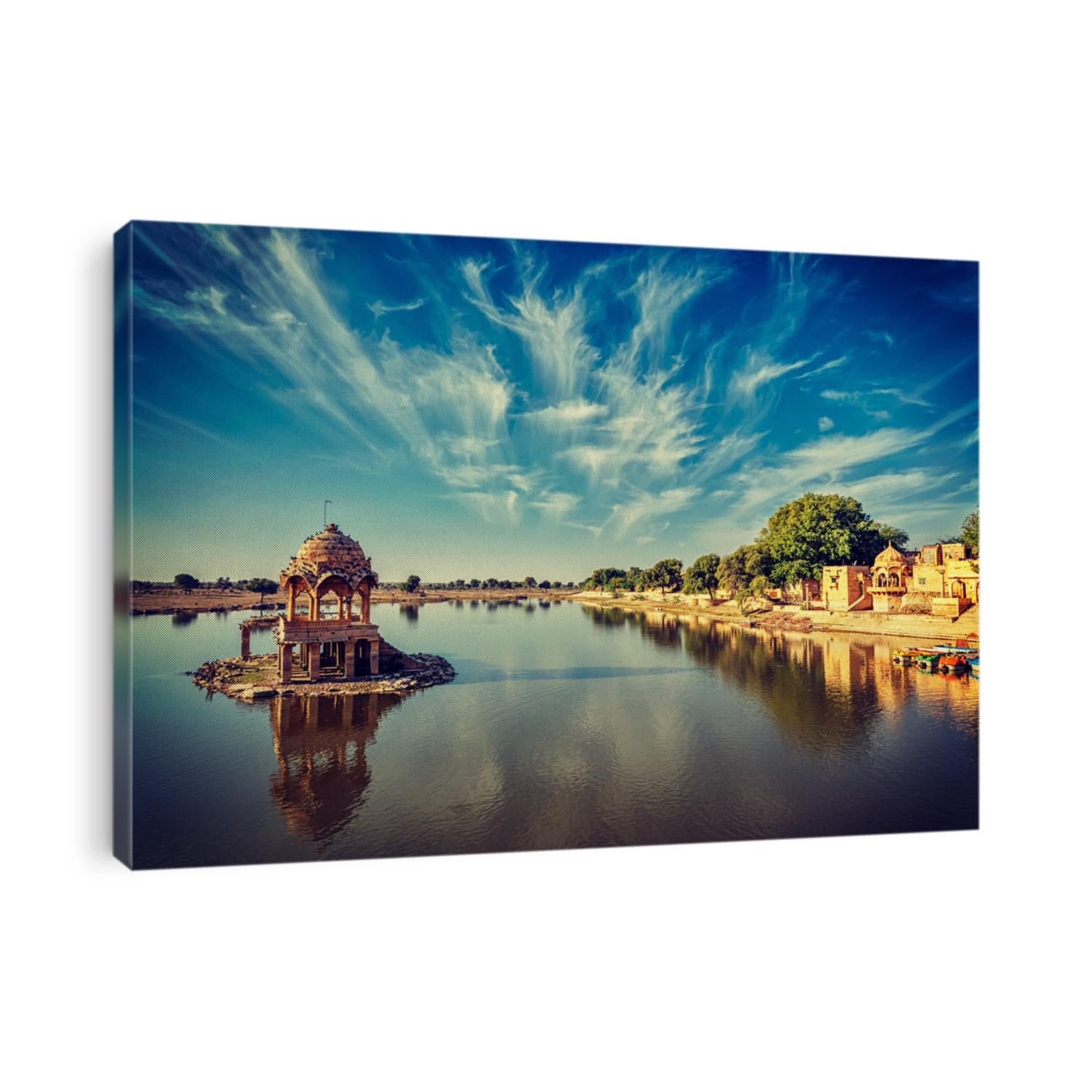 Vintage retro effect filtered hipster style image of Indian landmark Gadi Sagar - artificial lake. Jaisalmer, Rajasthan, India