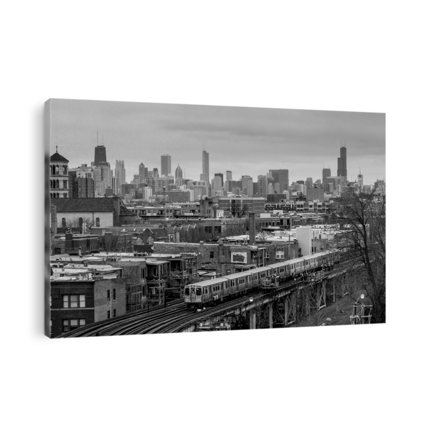 Dramatic shot of Chicago El train passing through older neighborhood with spectacular skyline in background on overcast day