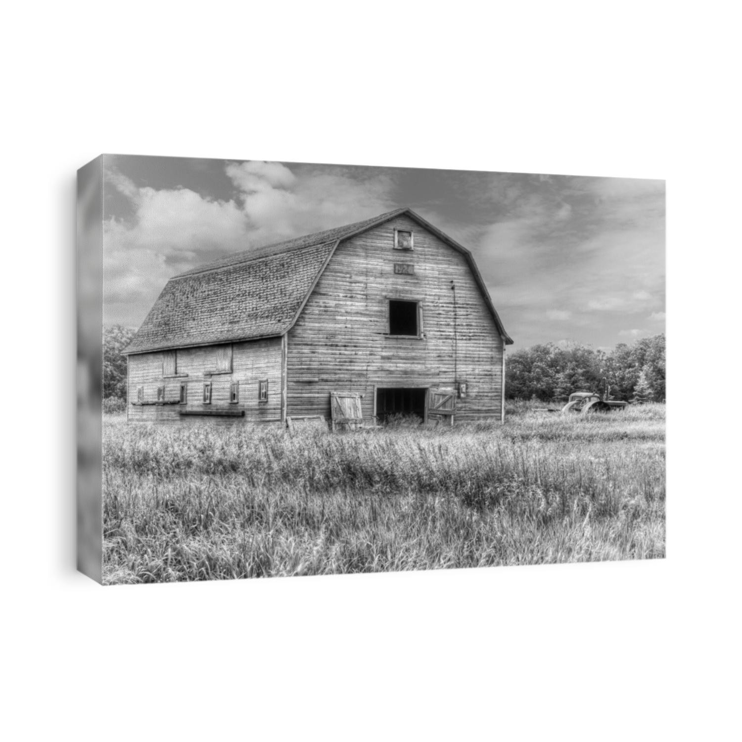 old weathered barn in black and white