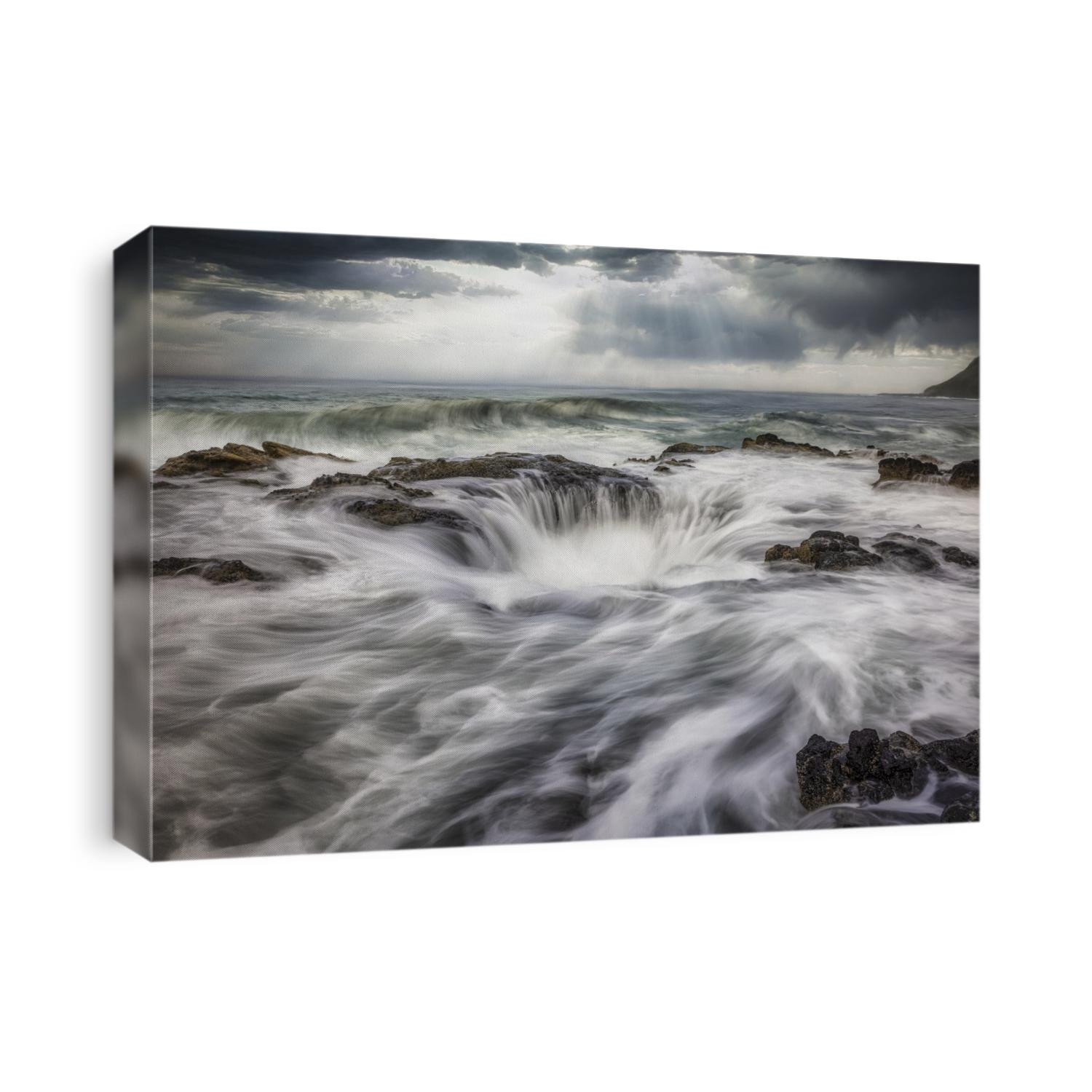 Waves crashing into Thors Well on the Oregon Coast