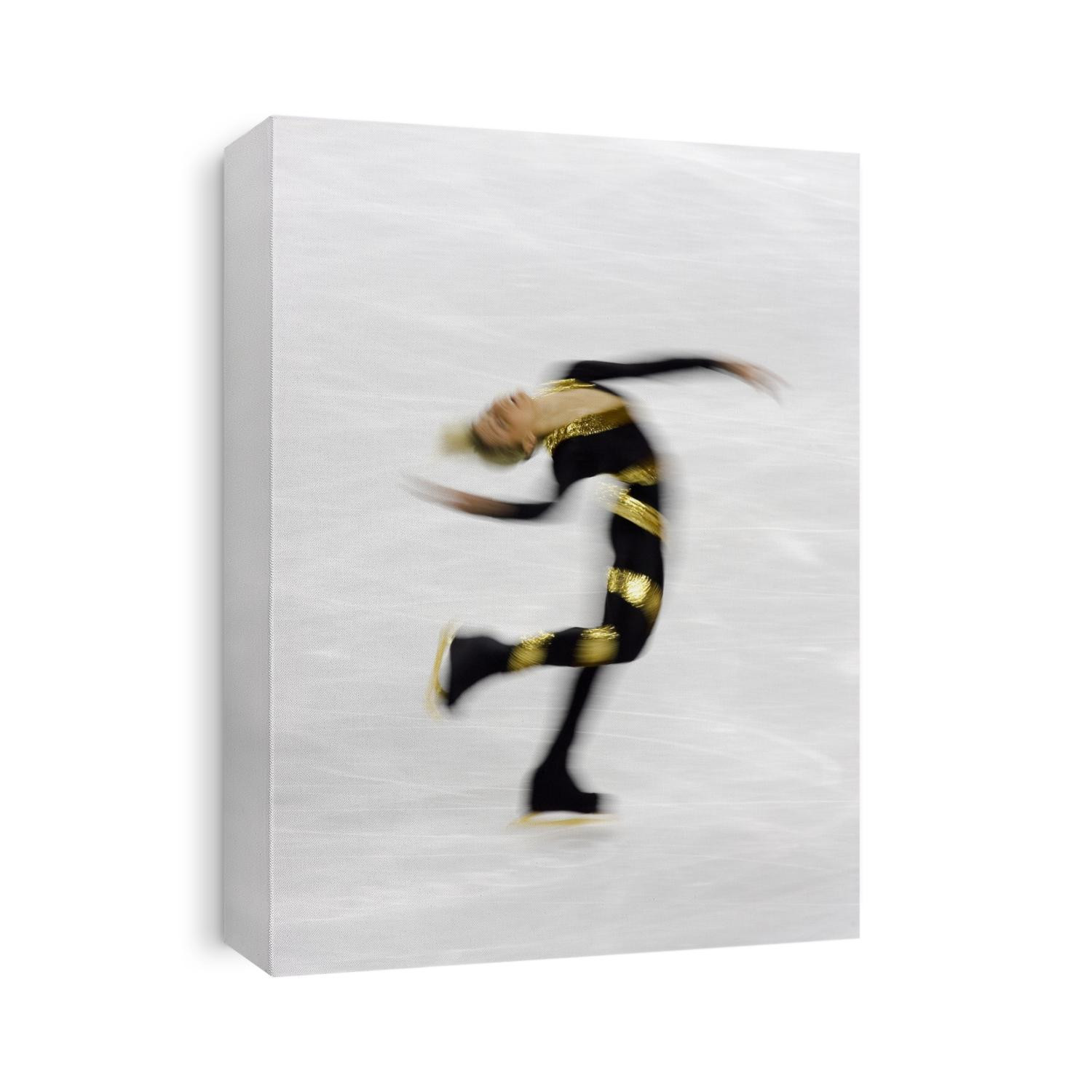 Blurred action of woman figure skater.