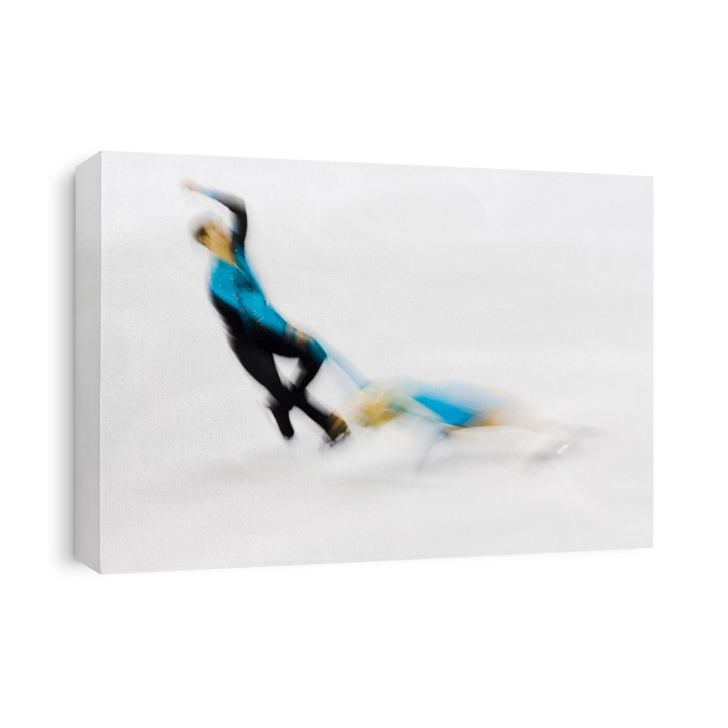 Blurred action of pairs figure skaters.