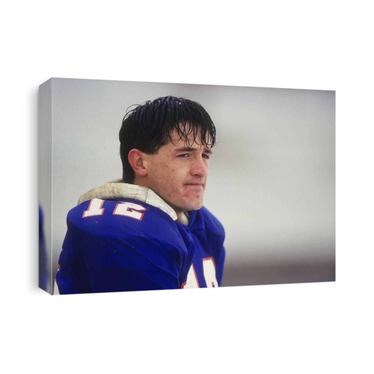 American football player on the bench.