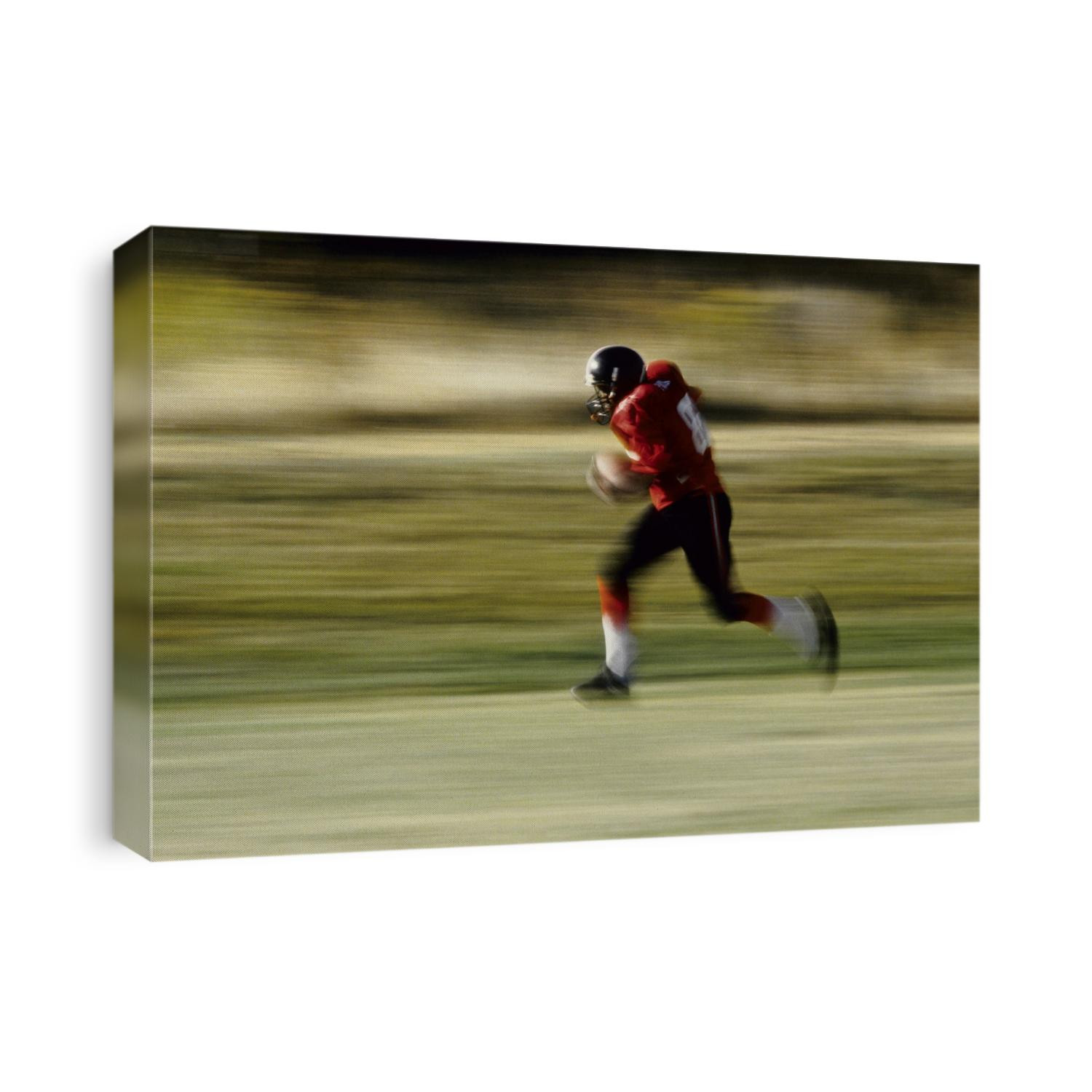 Football player running with the ball.