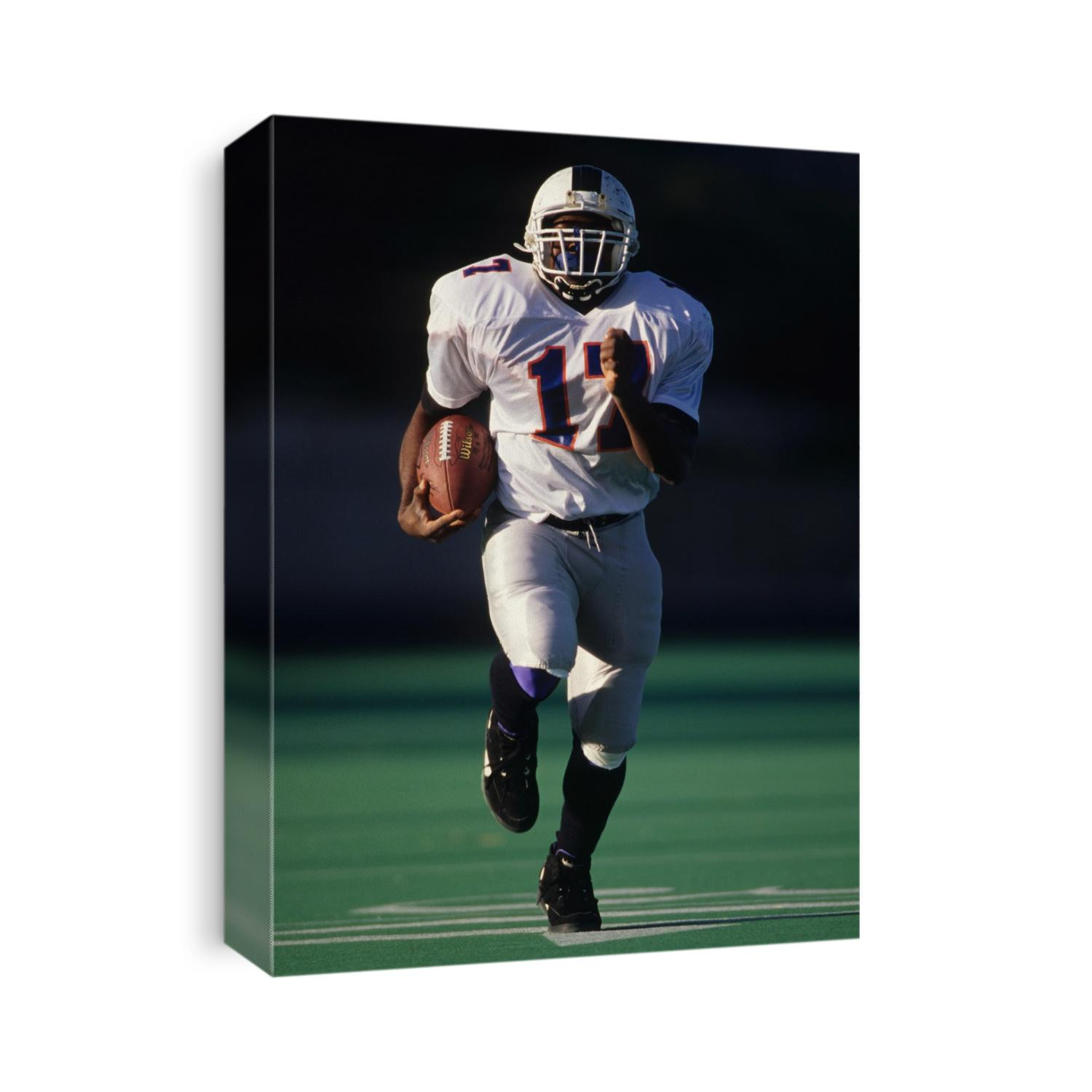 Football running back in action