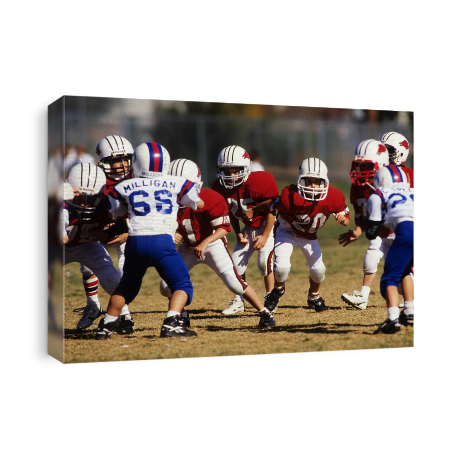 8 year old boys football action