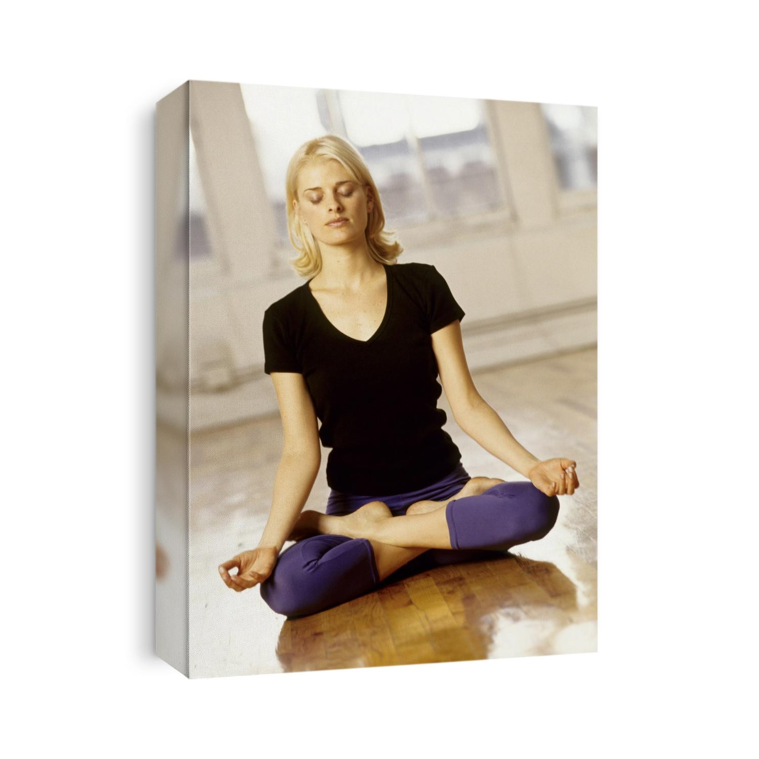 Young woman in yoga position.