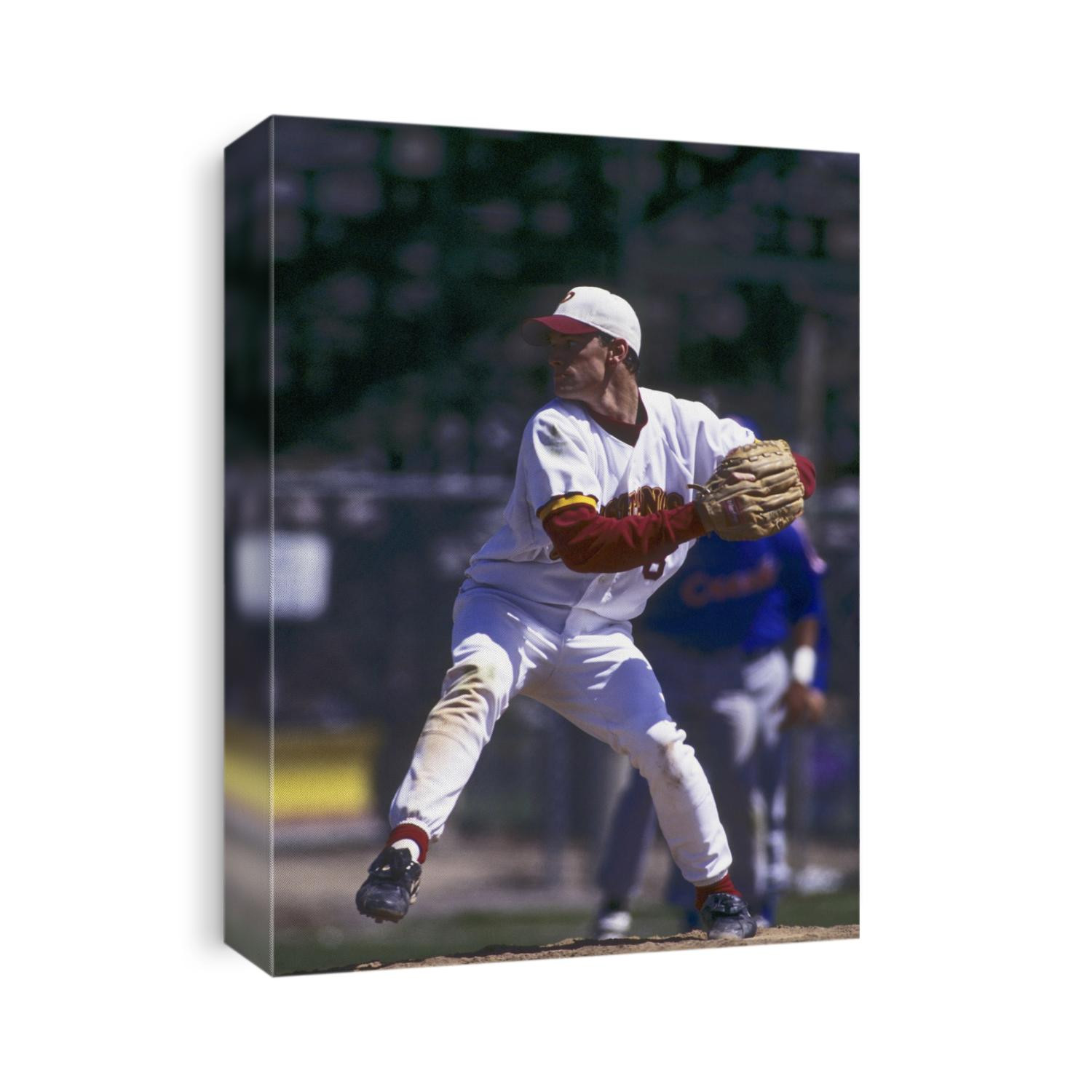 Baseball pitcher in action.