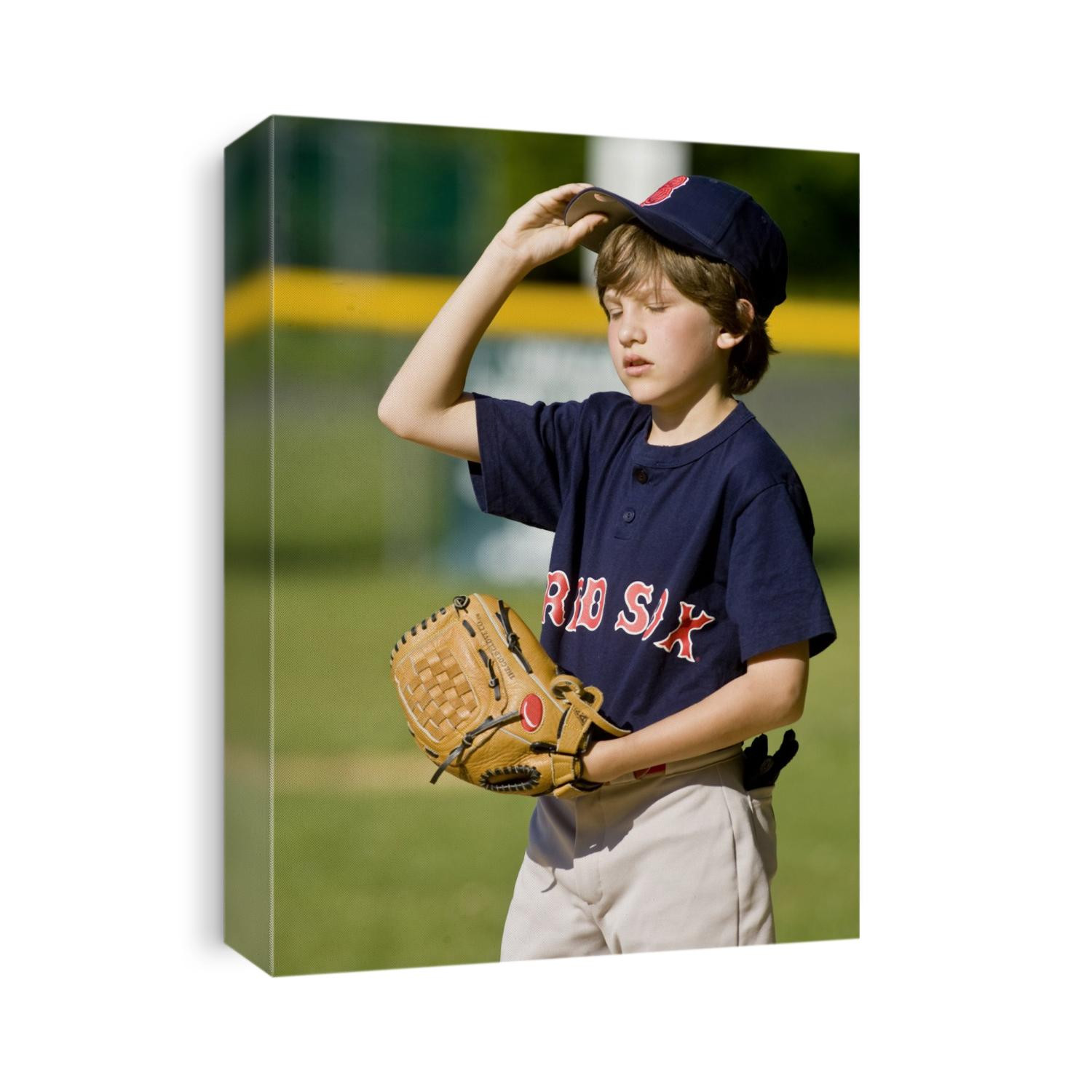 Portrait of 12 year old boy baseball player.