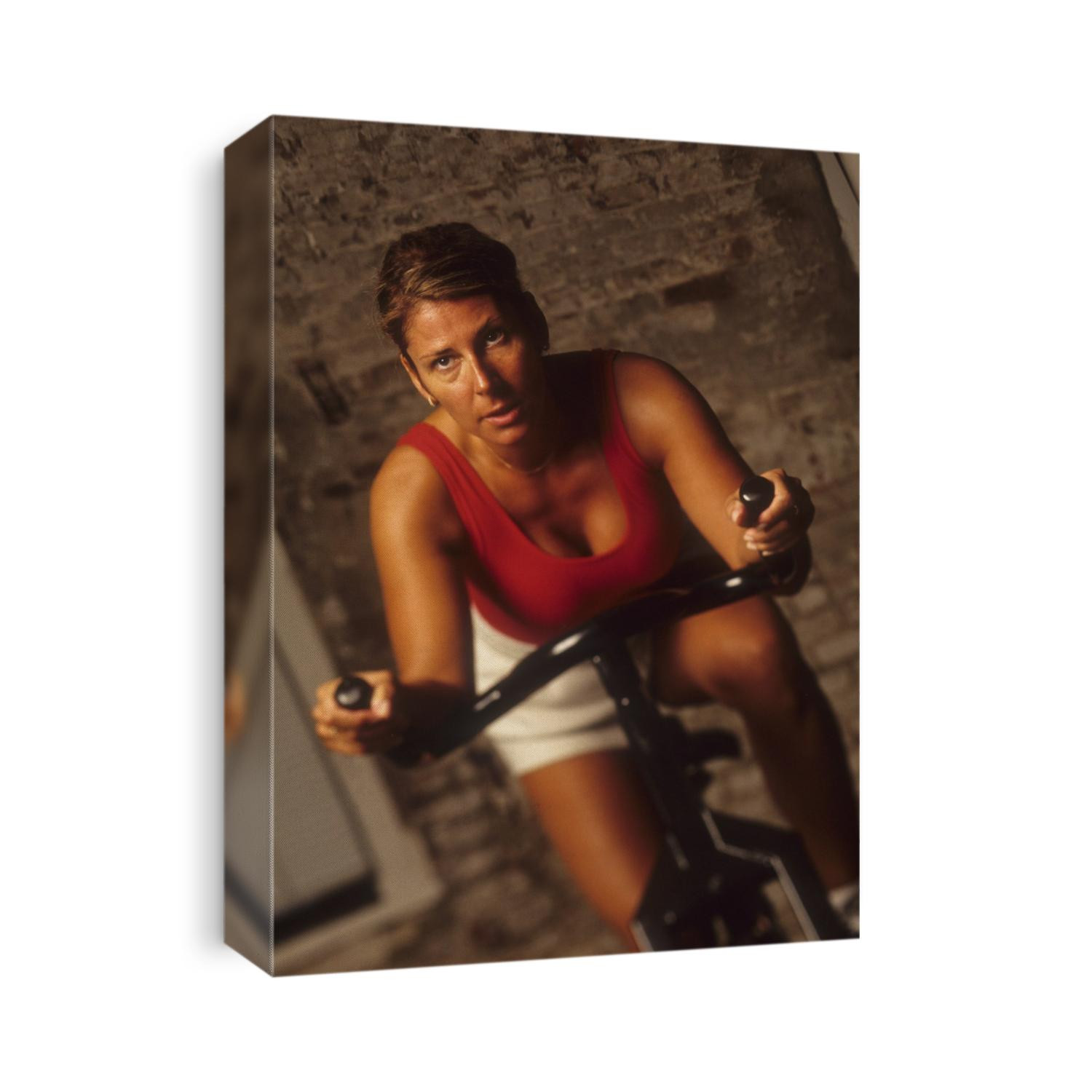 Woman exercising on a stationary bike.