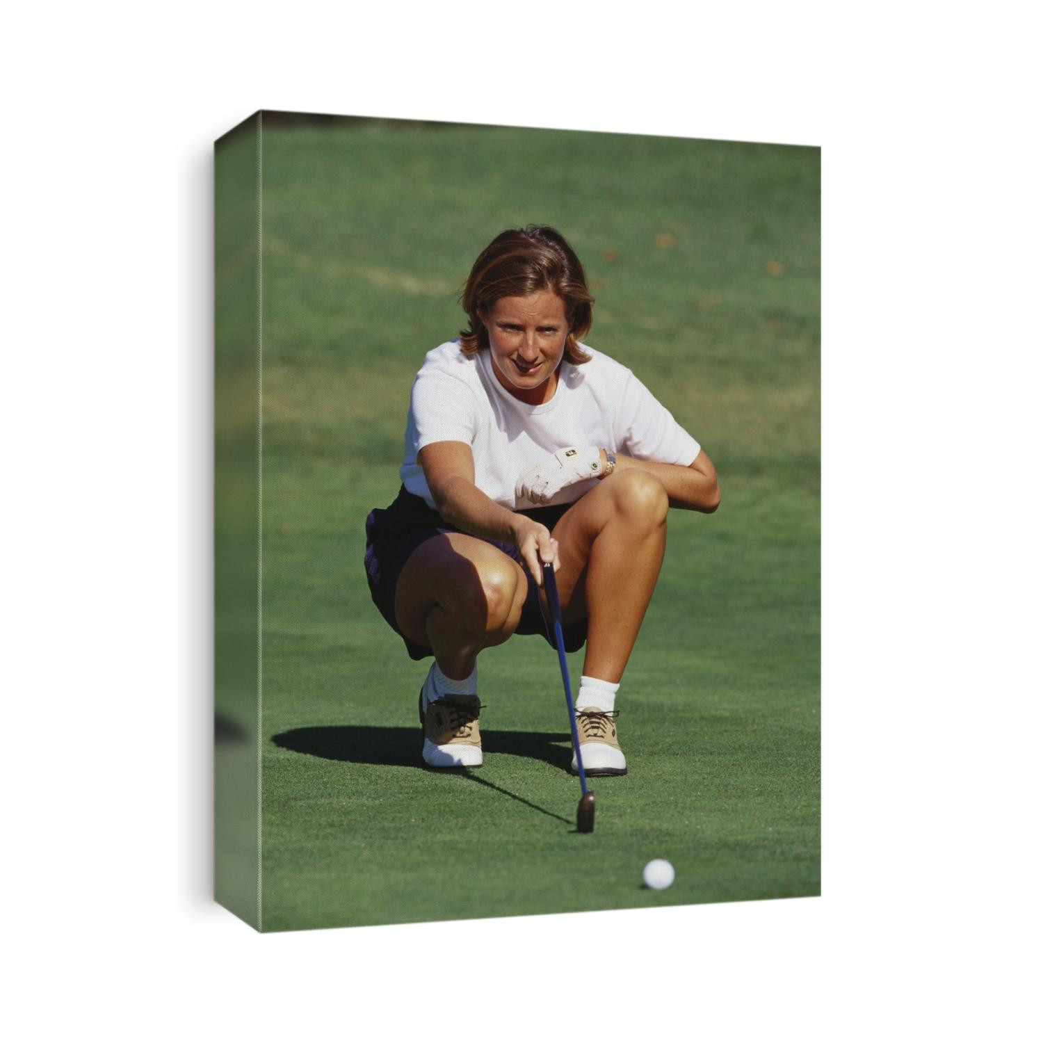 Woman golfer in action.