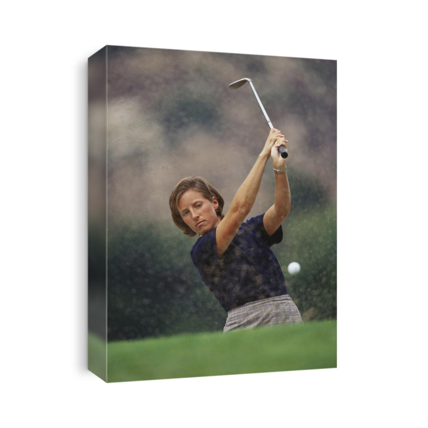 Woman golfer in action.
