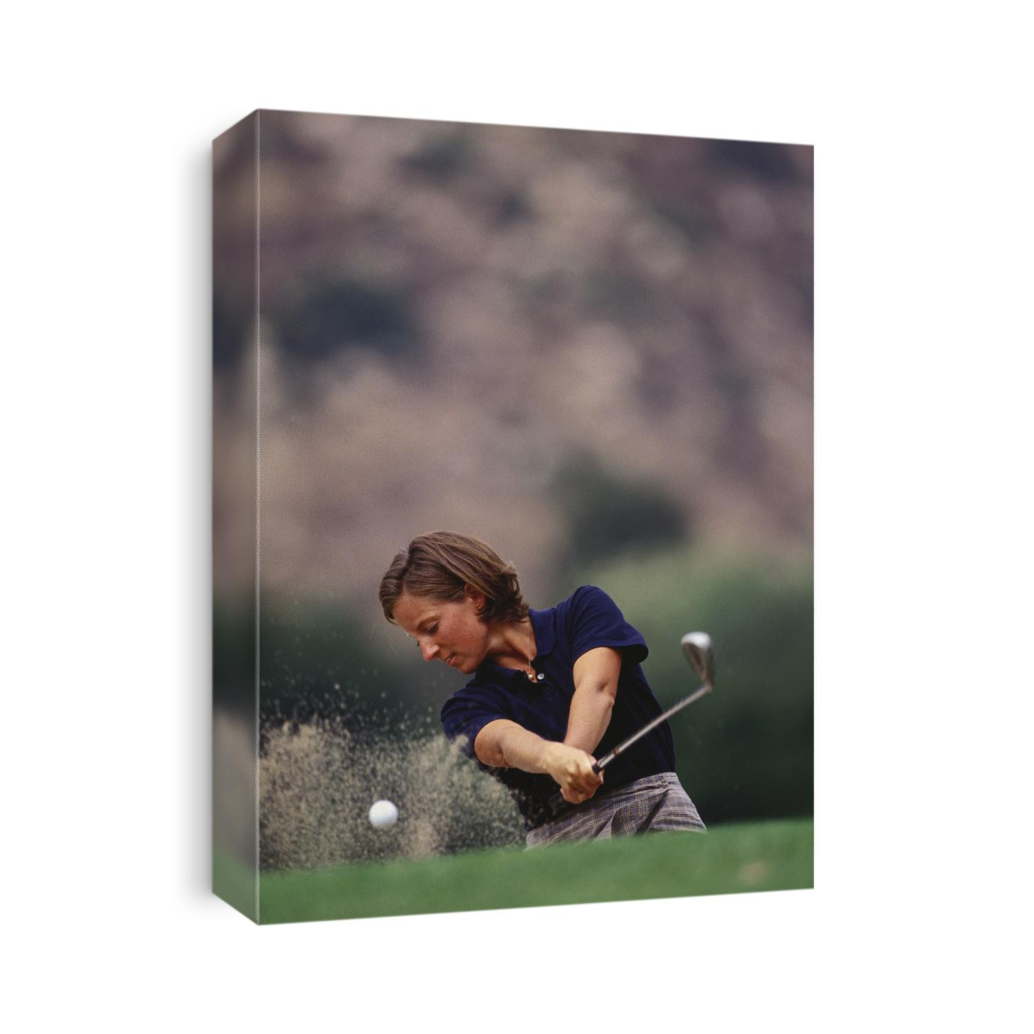 Woman golfer in action.