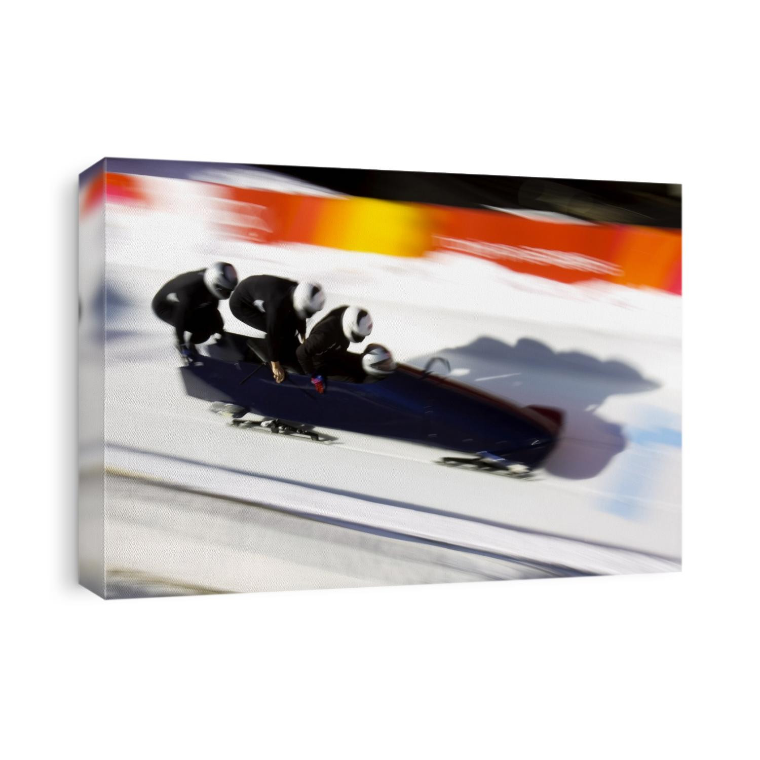 Start of a 4-man bobsled team in action.