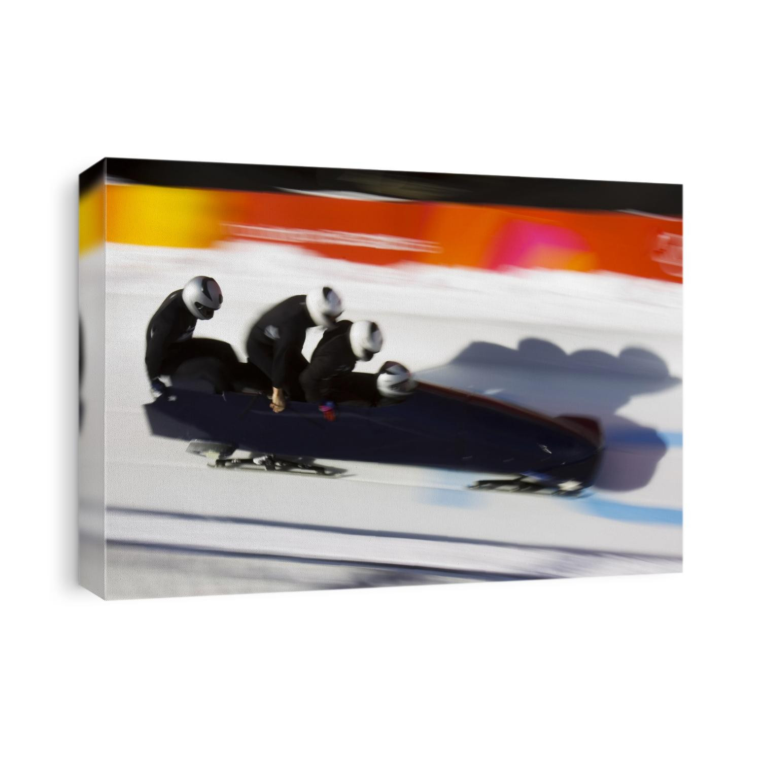 Start of a 4-man bobsled team in action.