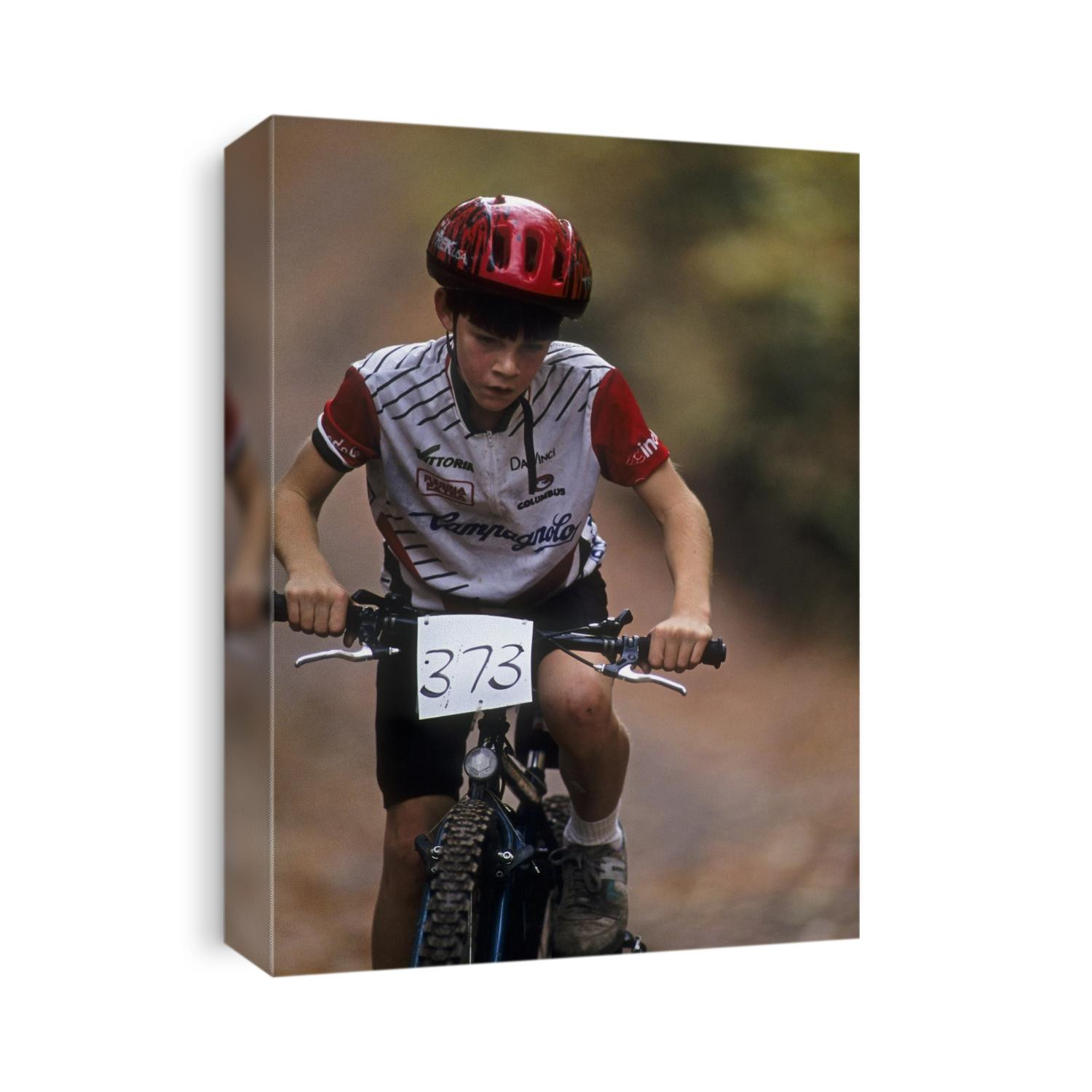 Young male mountain biker competing in a race. 1993 NY State Champpnships.