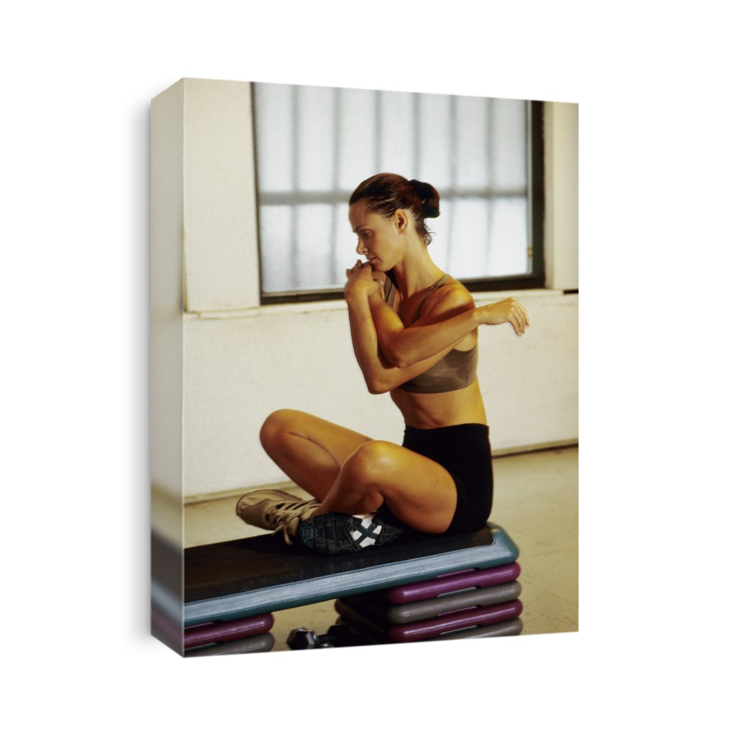 Woman stretching during working out.