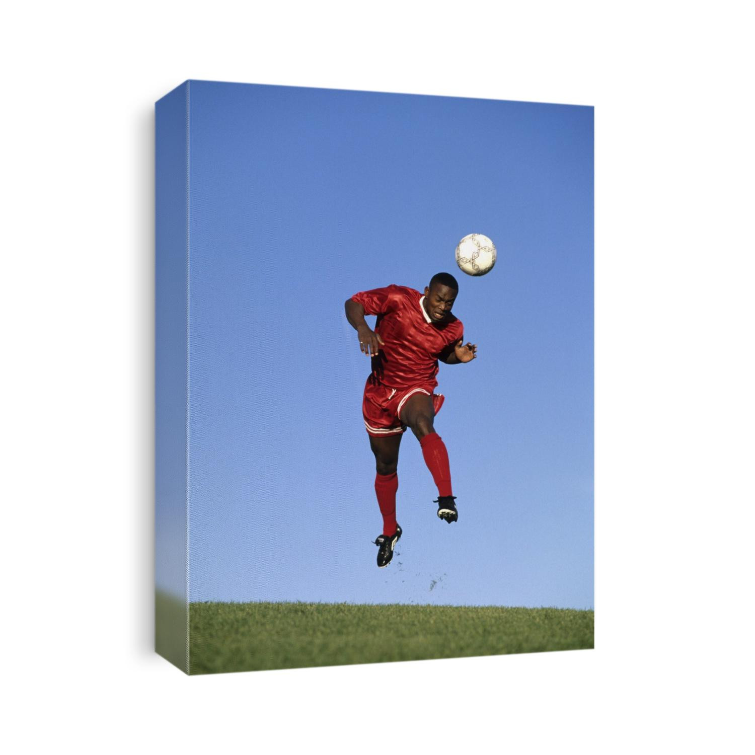Soccer player heading the ball