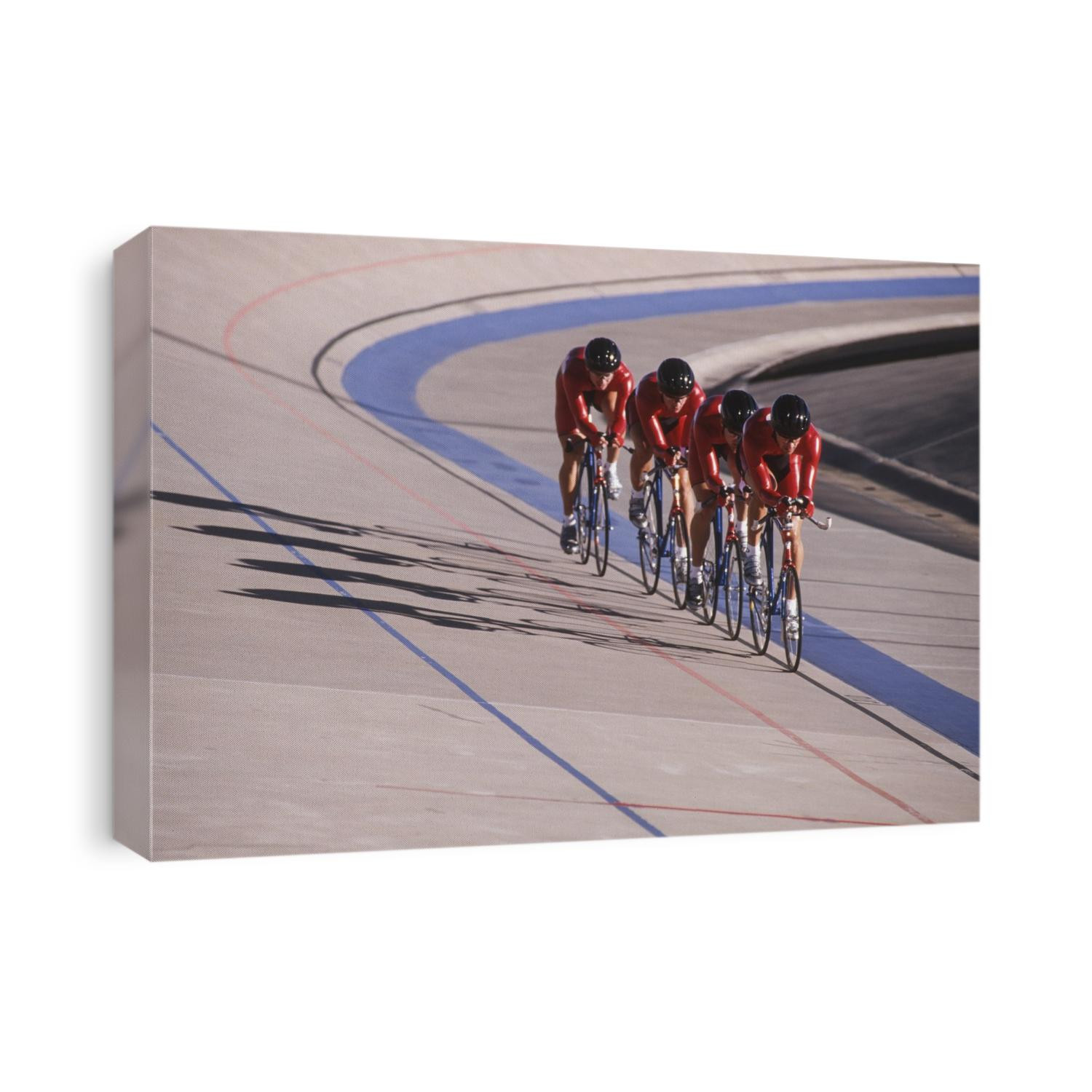 Male cycling team on the velodrome.
