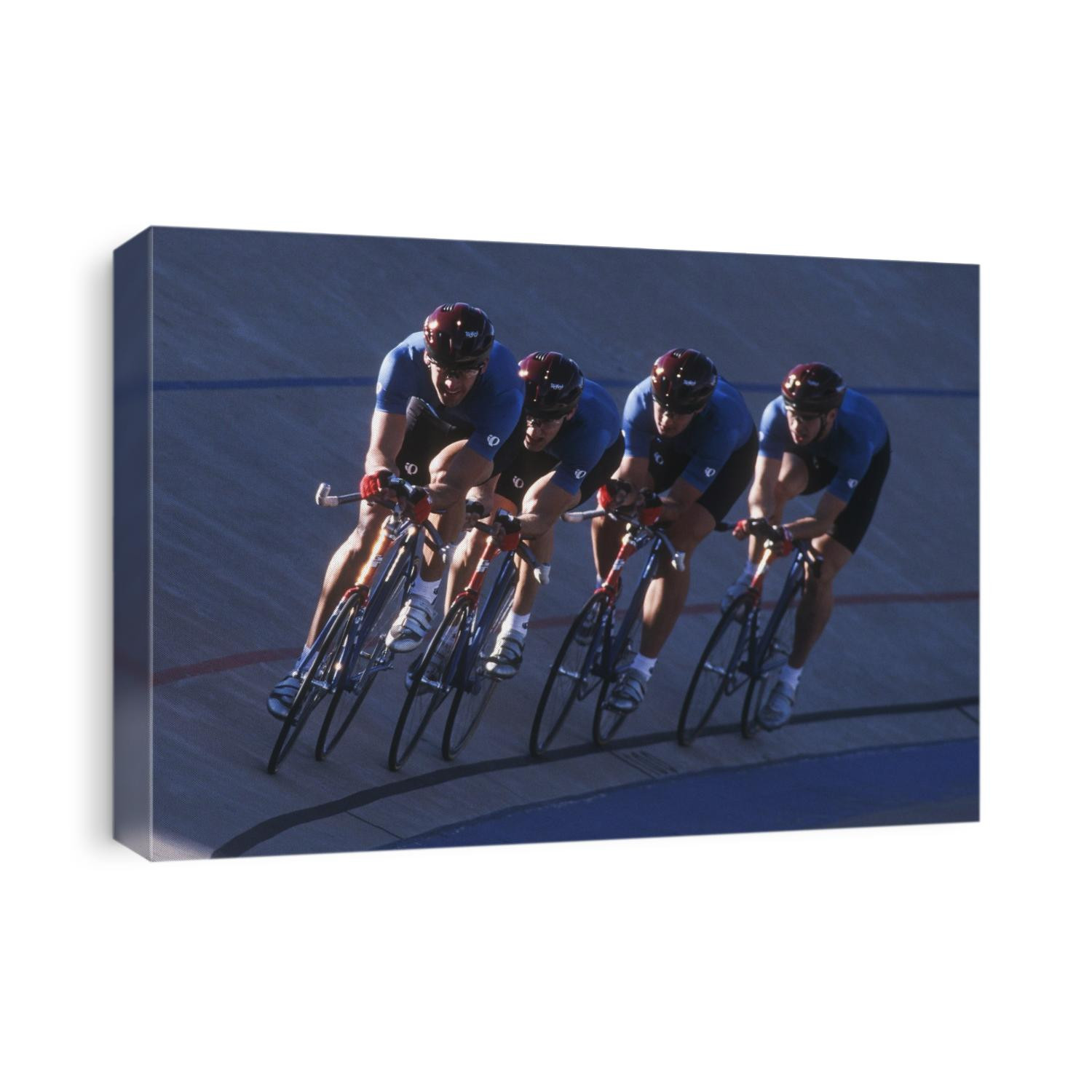 Male cycling team on the velodrome.