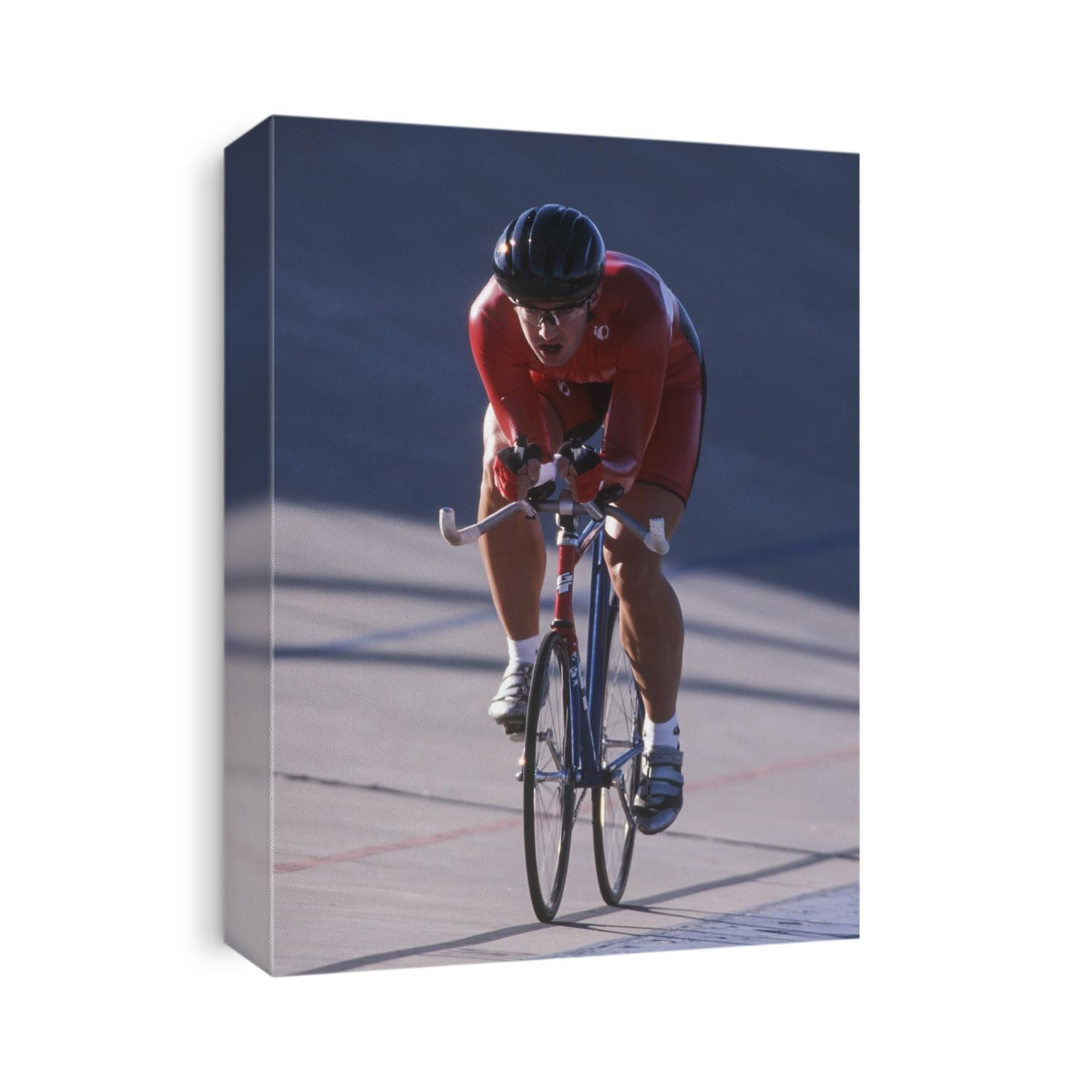 Male cyclist competing on the veledrome.