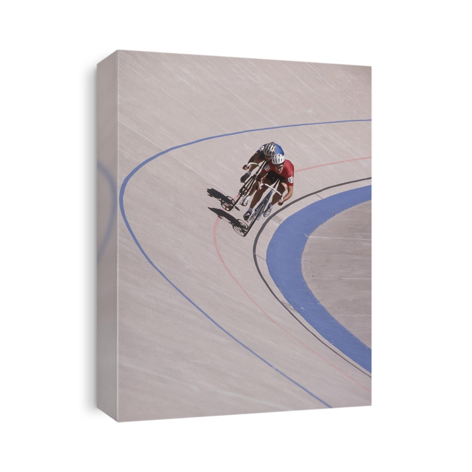 Male cyclists competing on the veledrome.