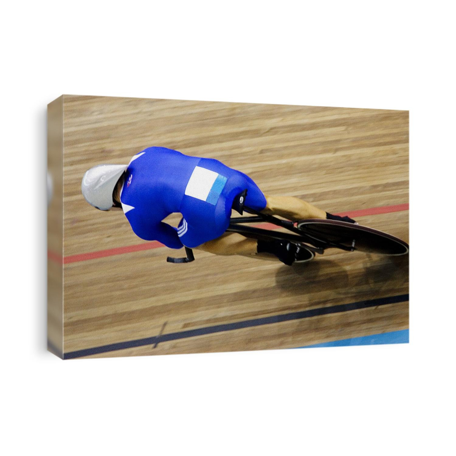 Cyclist racing on the velodrome track