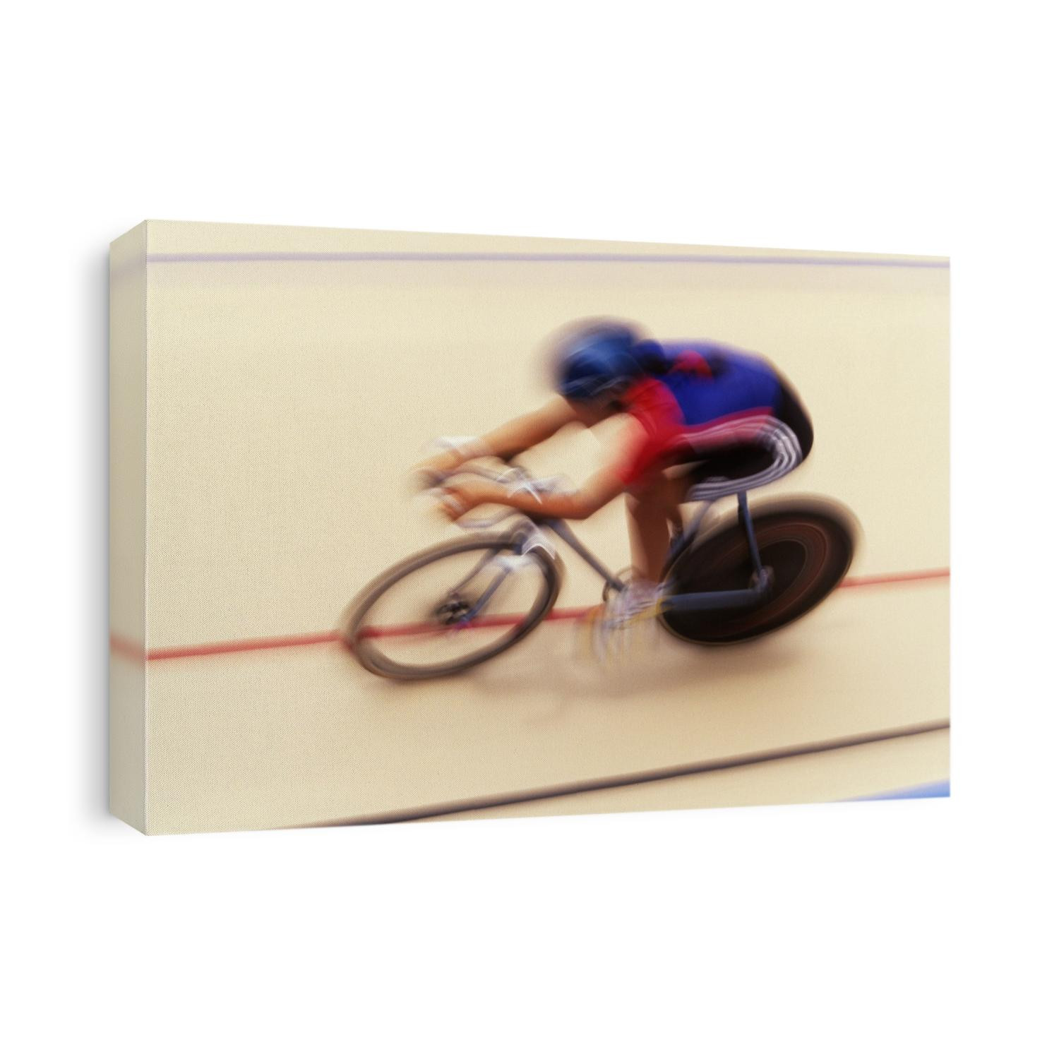 Blurred action of cyclist on the track.