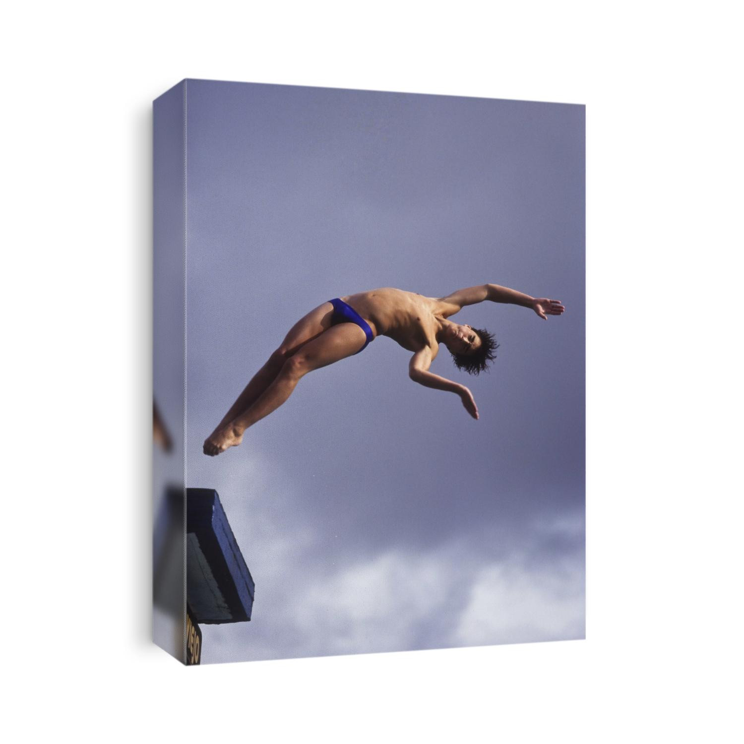 Male diver in the air.